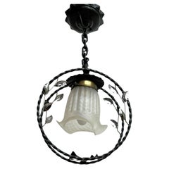 Swedish modern wrought iron pendant lamp with organic leaf decor, 1940s