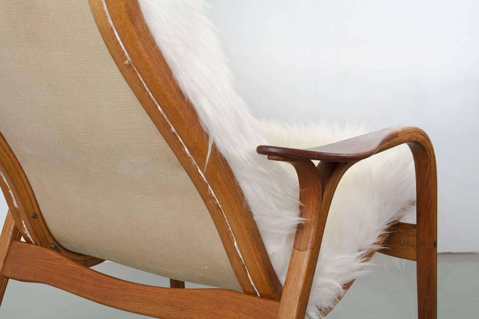 Scandinavian Modern Swedish Modern Yngve Ekström Lamino Chair with New Sheepskin Upholstery