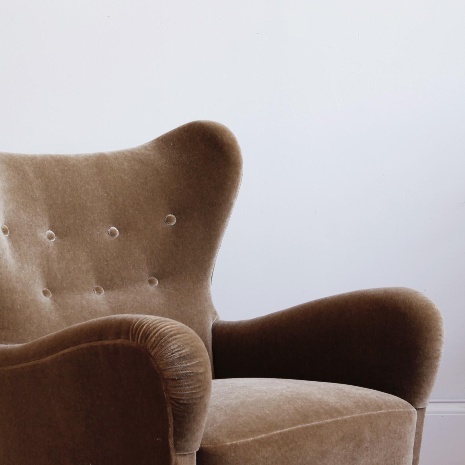 A curvy, comfy lounge chair fully restored and reupholstered in a shiitake-colored mohair.

Otto Schulz was an architect and designer born in Germany, who moved to Sweden and founded in Gothenburg what quickly became one of Sweden’s most