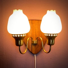 Swedish modernist brass and opal glass wall lamp, 1960s