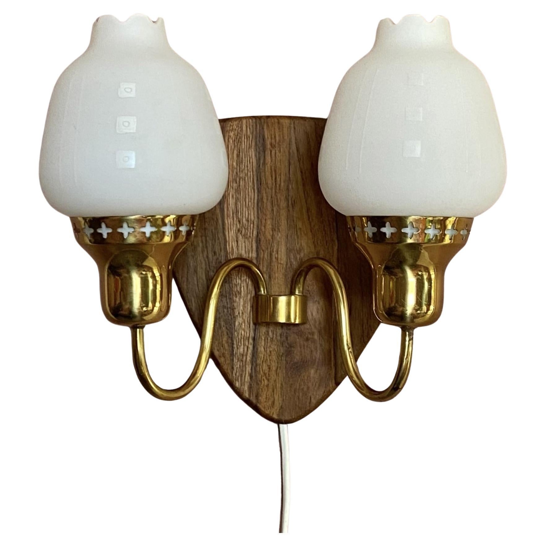 Swedish modernist brass and opal glass wall lamp, 1960s For Sale