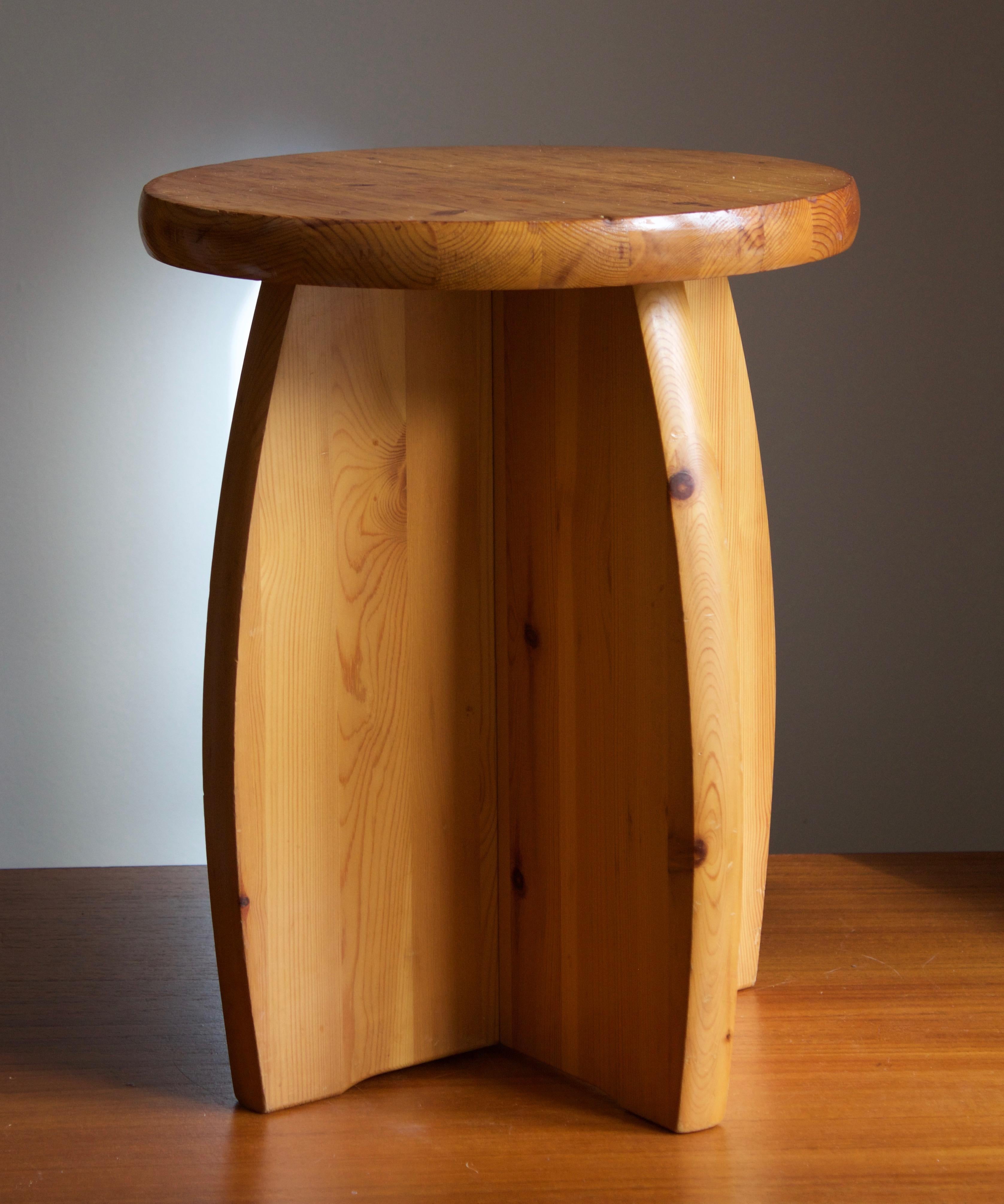 A Swedish pinewood stool or side table. By unknown designer, 1970s.





