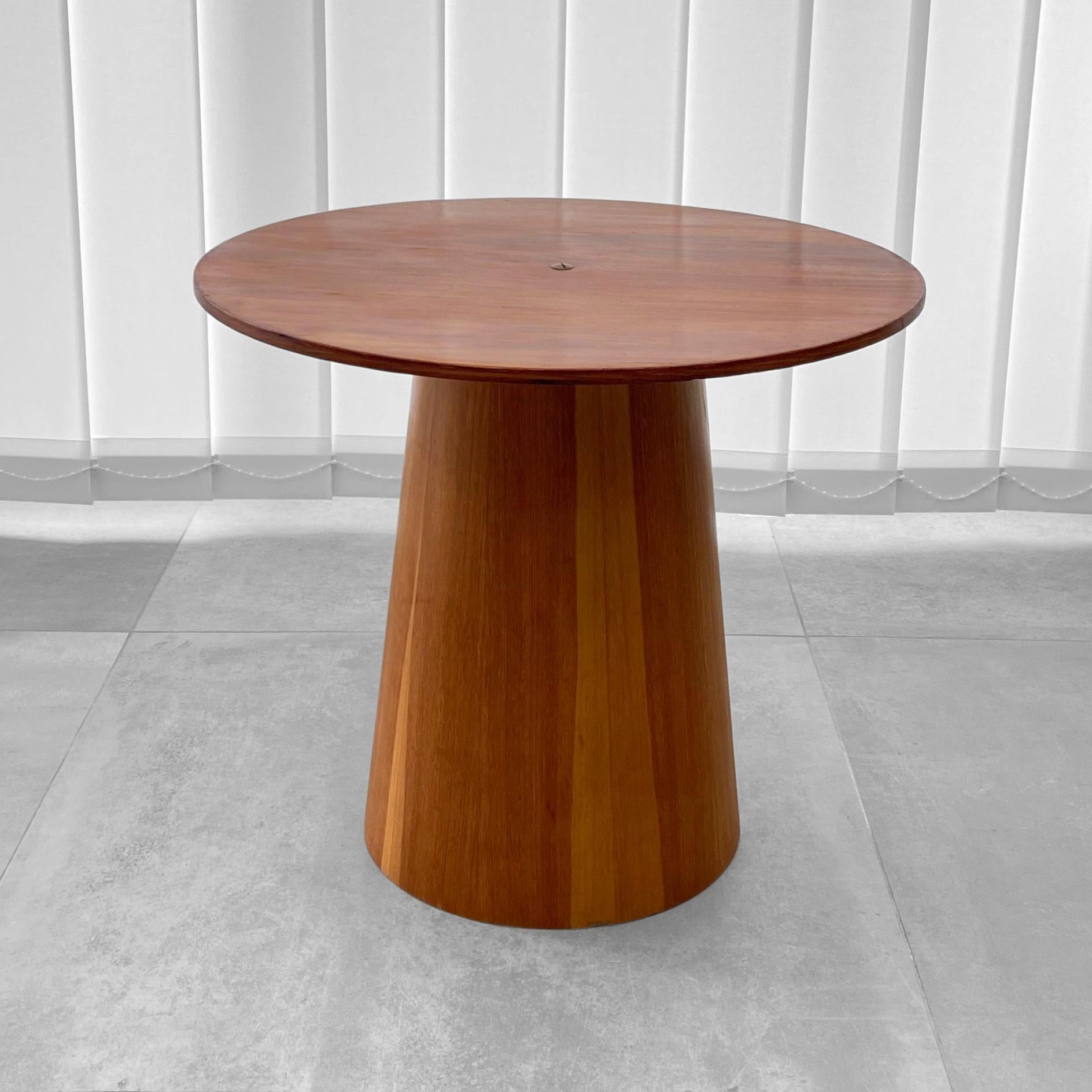 Swedish modernist mushroom side table designed by Martin Åberg, produced in the 1960s by the manufacturer Servex. It features a circular pine plywood tabletop resting on a conical foot made from molded pine veneer. The tabletop is secured by a brass