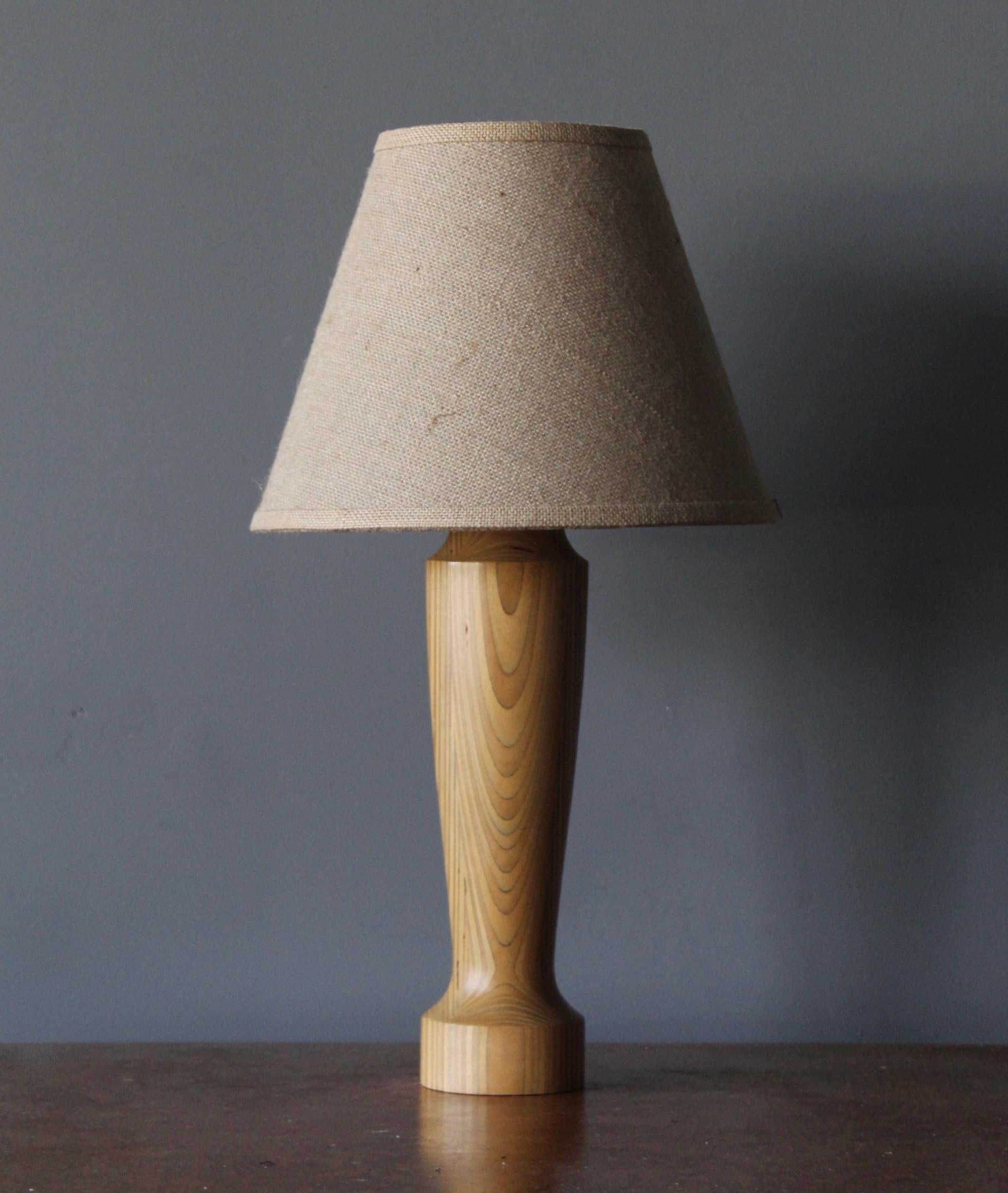 A pair of modernist table lamps. In stack-laminated turned wood with a highly sculptural appeal and beautiful texture. Produced in Sweden by an anonymous creator, 1960s.

Sold without lampshades, dimensions exclude lampshades, height includes