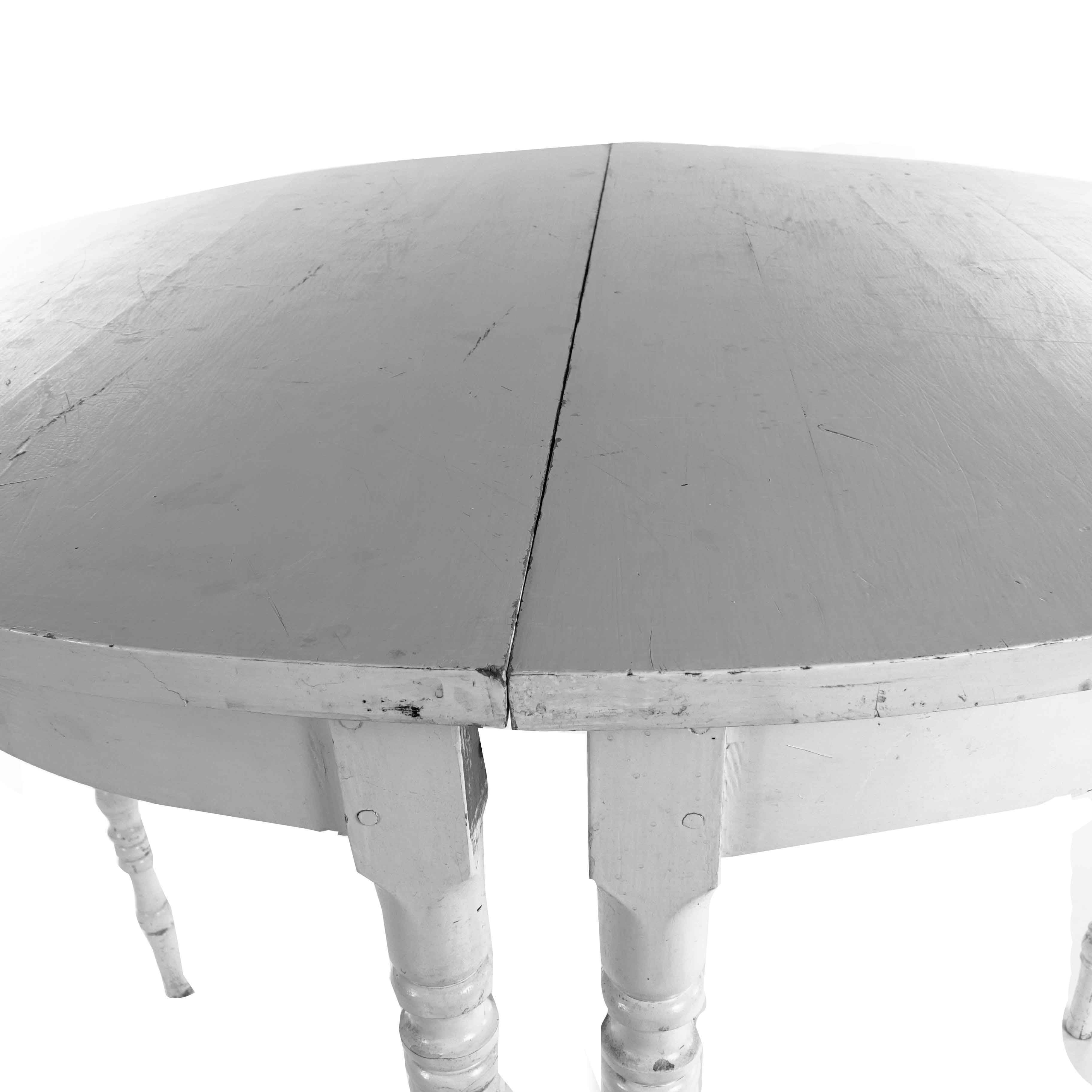 Fantastic unique looking moon tables with beautiful lines. White painted pine in good condition