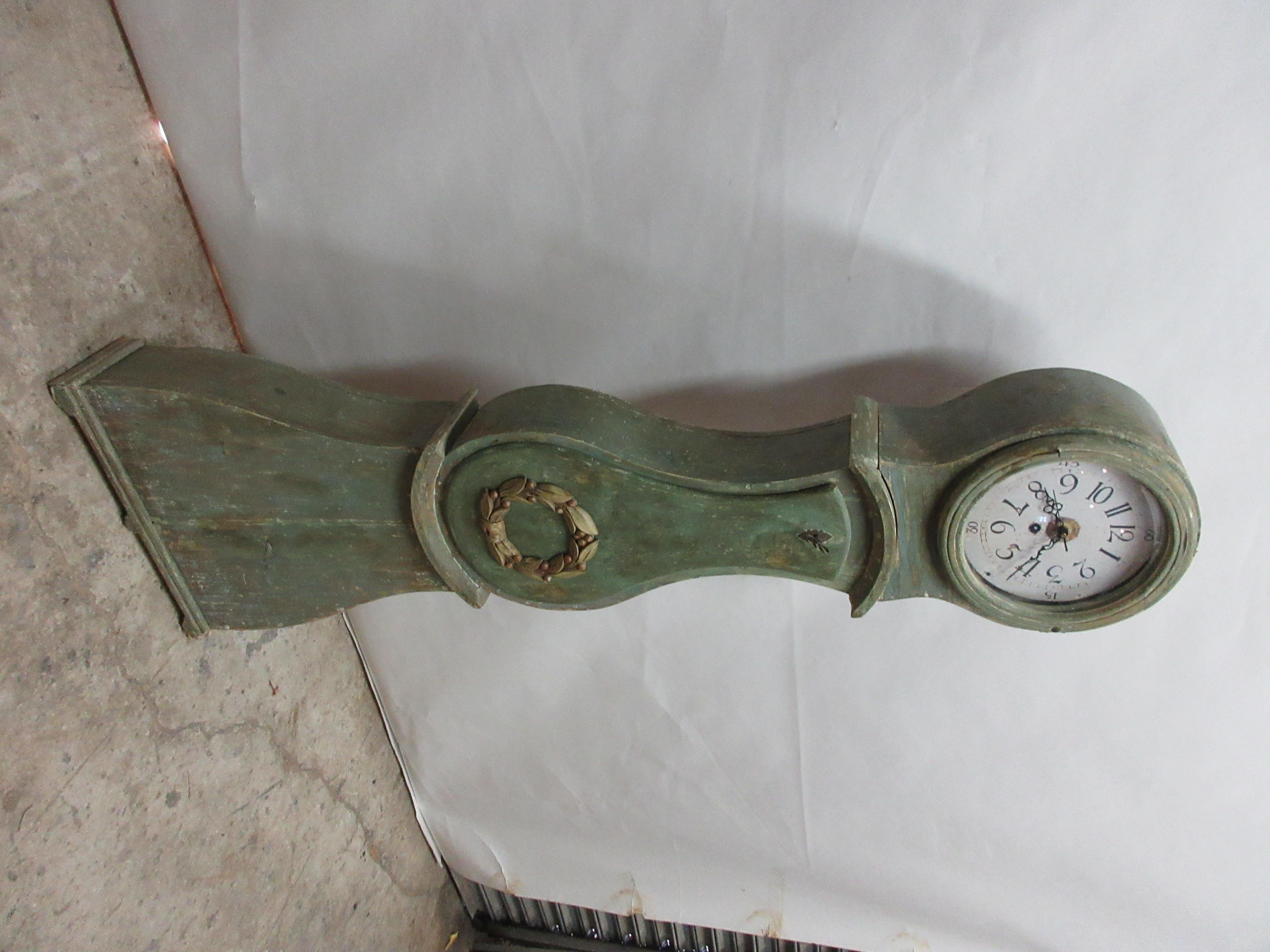 This is an original painted Swedish Mora clock. New battery works have been installed with a Reproduction face. You have a choice of chimes, a volume nob, a switch that will not let it ring at night and a turn off the chime switch. They are great