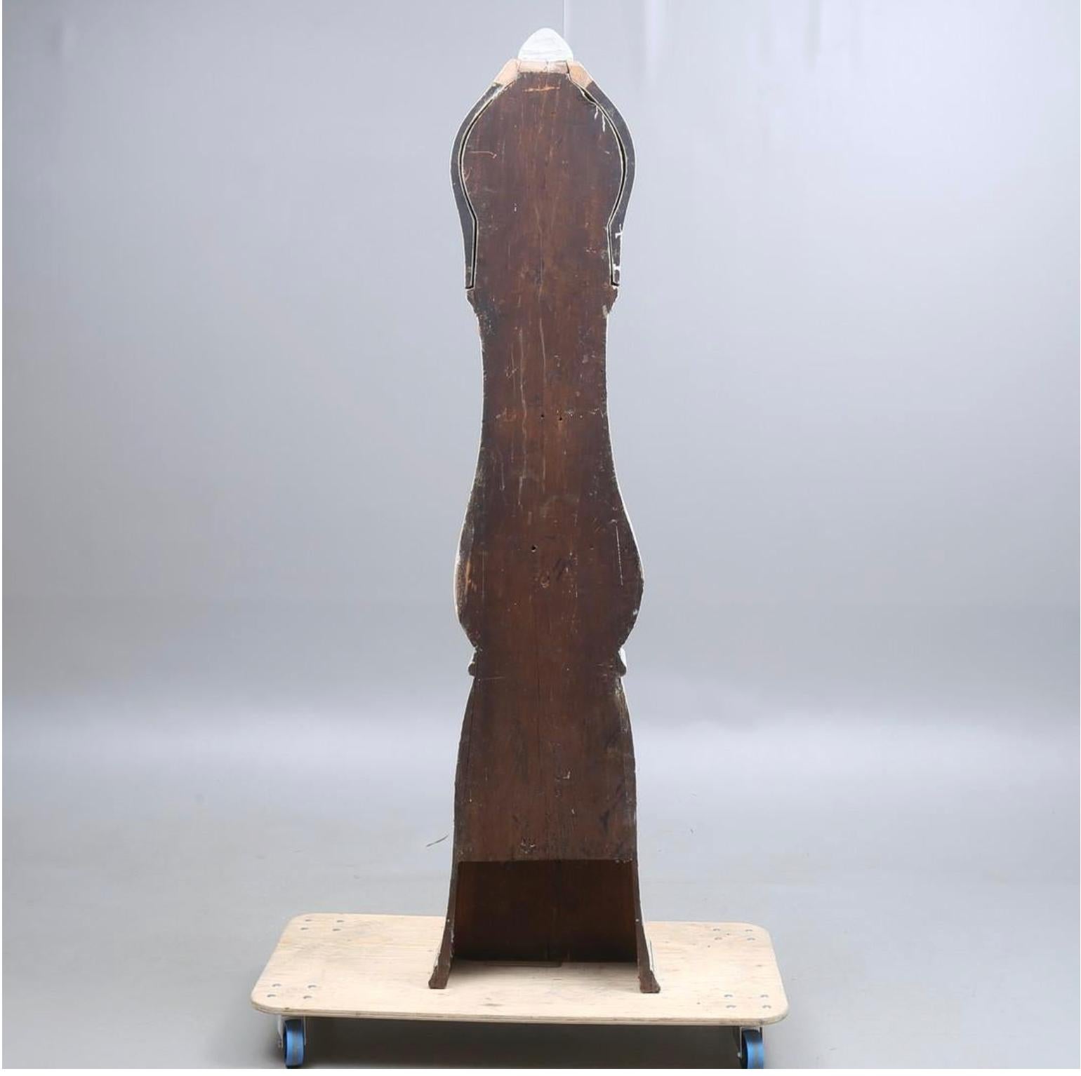 Decorative early 1800s antique Swedish mora clock in white paint finish detail and a slender body. Measures: 214cm.

This original 1800s mora clock has a niceface with some enamel missing/lifting.

The clock body is distressed as befits its age and