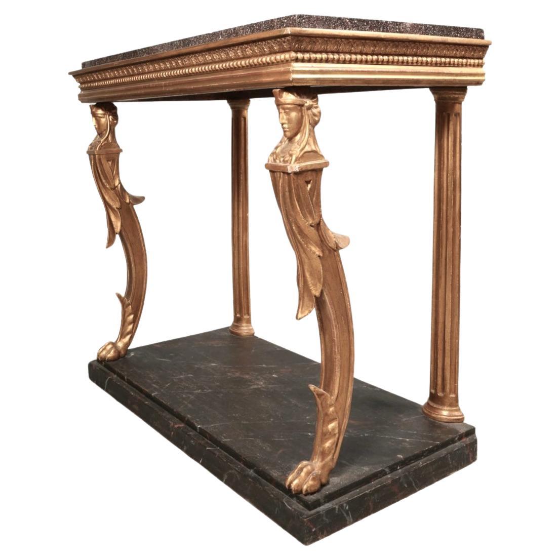Elegant 19th century Swedish Neoclassical painted and parcel gilt console table with marble top. Front gilded leg supports feature heads of Greek men along paw feet. Console features inset rectangular porphyry top above beaded frieze raised on
