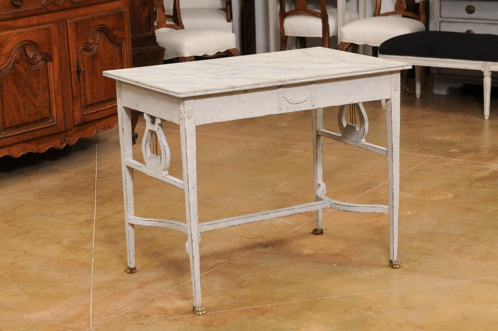 Carved Swedish Neoclassical Style Painted Hall Table with Lyre Motifs and Lion Feet For Sale