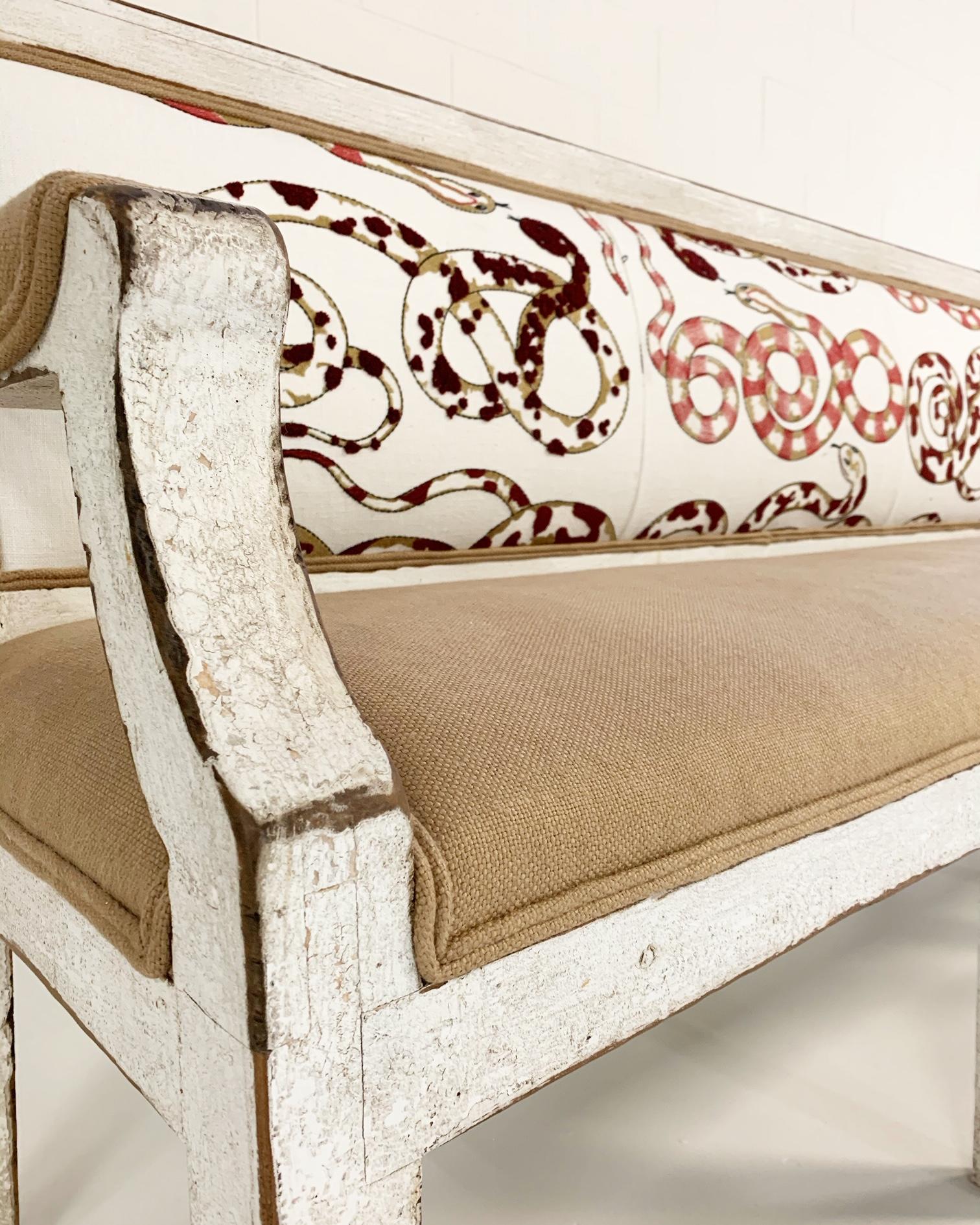 This over 7-foot long antique Swedish bench has such a distinct presence. We wanted to give the aged painted wood patina a punch, so we restored in the cult-favorite Pierre Frey Venimeuses fabric for the back bordered with a double welt of Loro