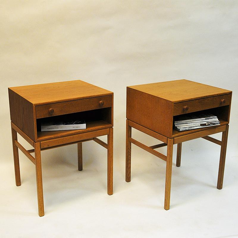 Great pair of oak veneer night tables model Casino - from the Bra Bohag range designed by Engström & Myrstrand for Tingströms 1960s Sweden. These tables can be used standing together as a pair or seperated as single small tables. Each table has a