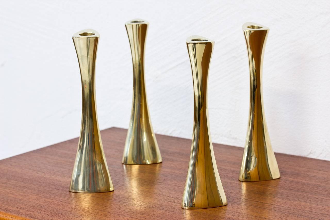 Organic shaped polished brass candlesticks designed by K.E. Ytterberg for BCA Eskilstuna in Sweden in the 1960s.
