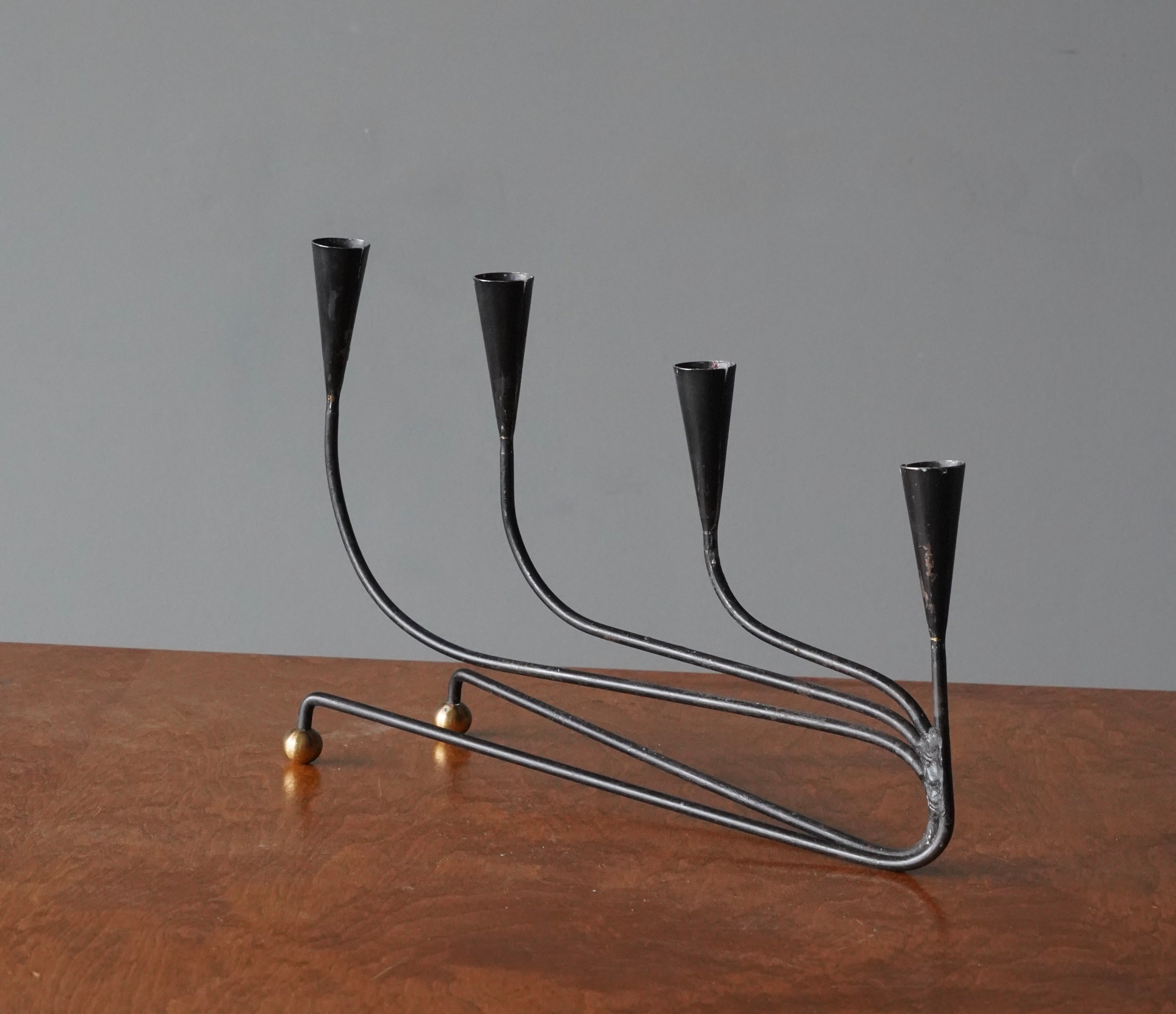 A candlelabra. Designed and produced in Sweden, c. 1950s. 

 