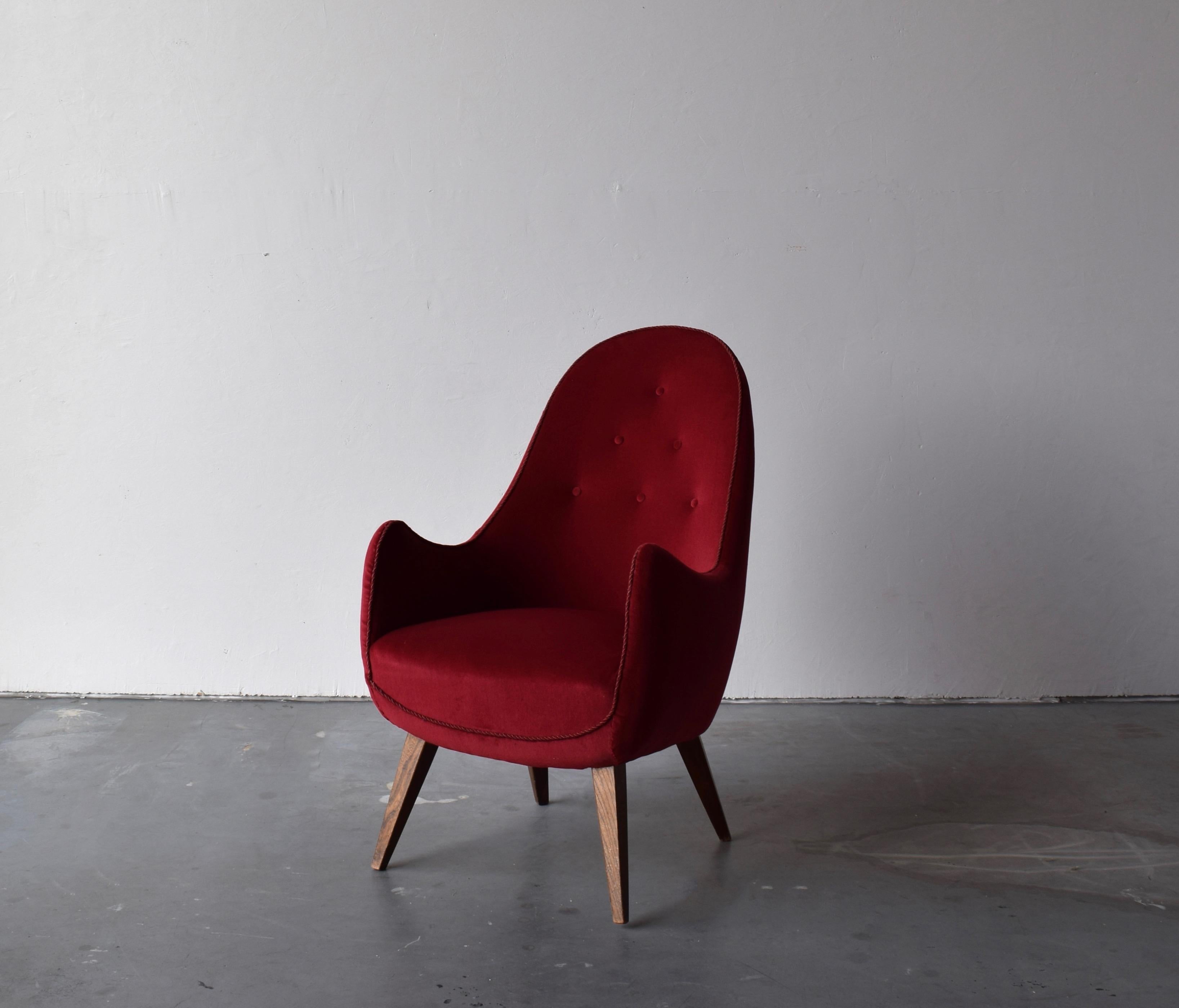 A lounge chair / armchair / side chair. Designed and produced in Sweden, 1950s. Maker and designer unknown. 

Other designers of the period include Jean Royère, Gio Ponti, Finn Juhl, Vladimir Kagan.