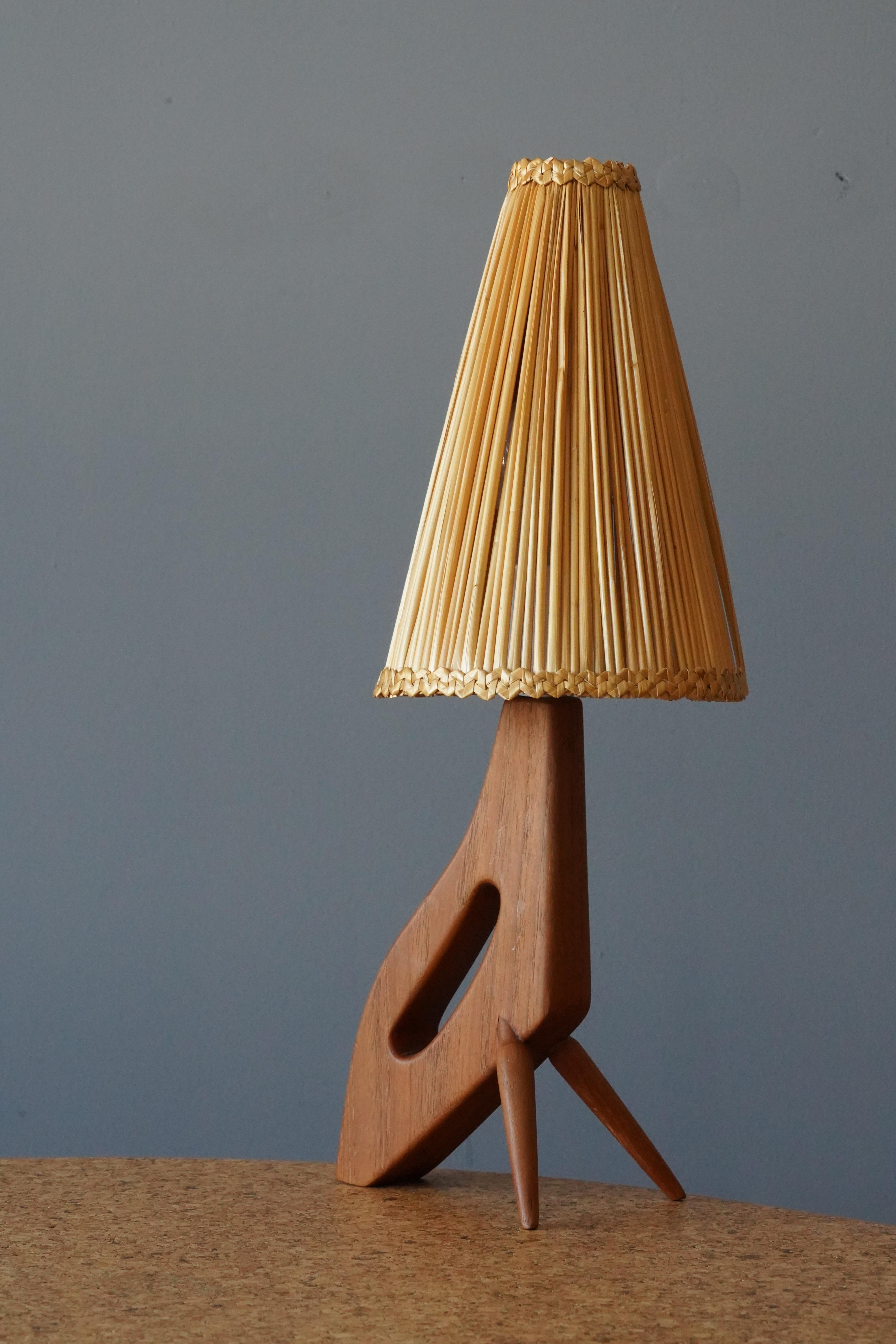 A table lamp designed and produced in Sweden in, c. 1960s. Likely original lampshade.

Stated dimensions exclude lampshade, height includes the socket.