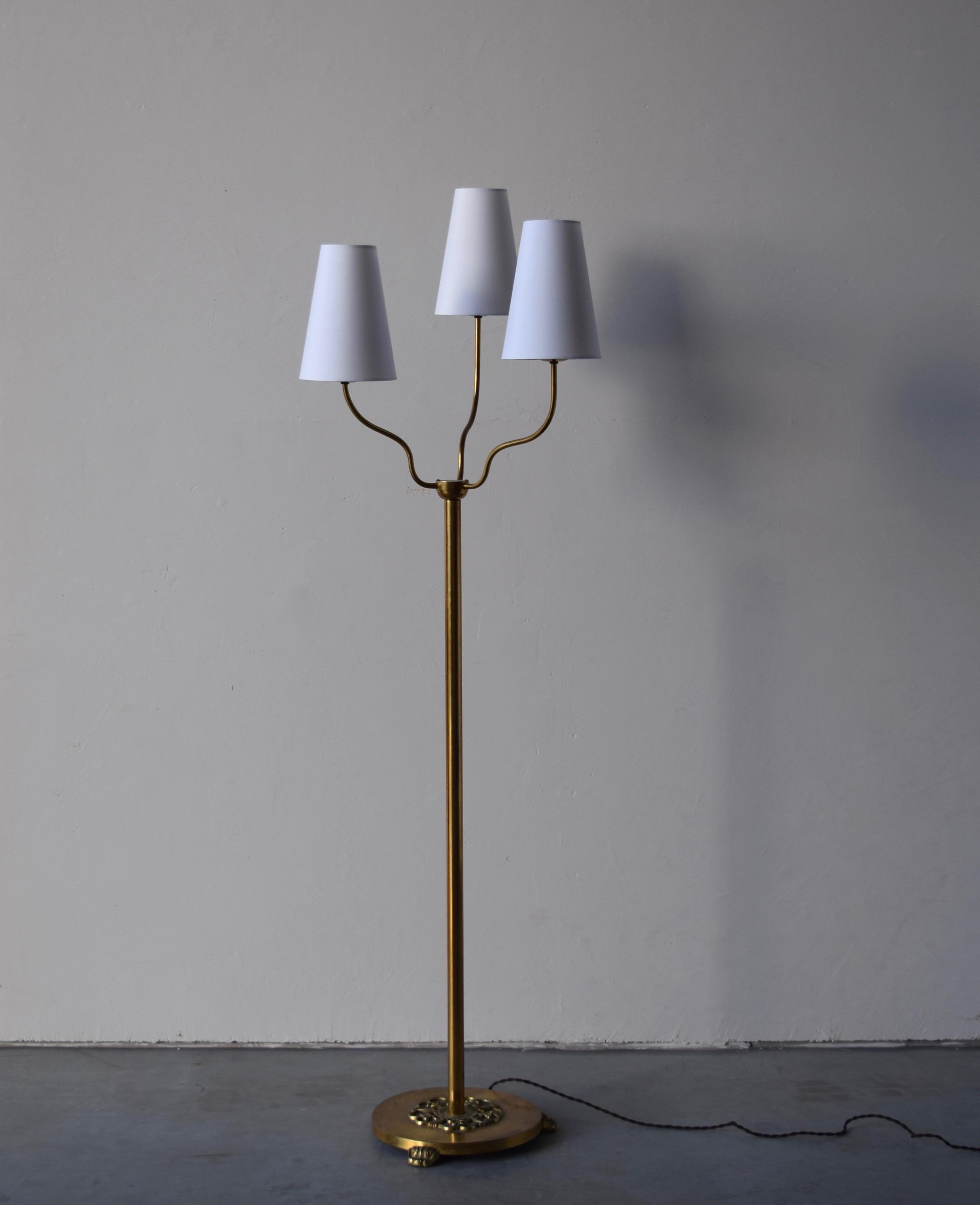 A table lamp, designed and produced in Sweden, 1940s. Features three organic arms. Brand new high-end lampshades. 

Other designers of the period include Paavo Tynell, Alvar Aalto, Josef Frank, and Lisa Johansson-Pape.