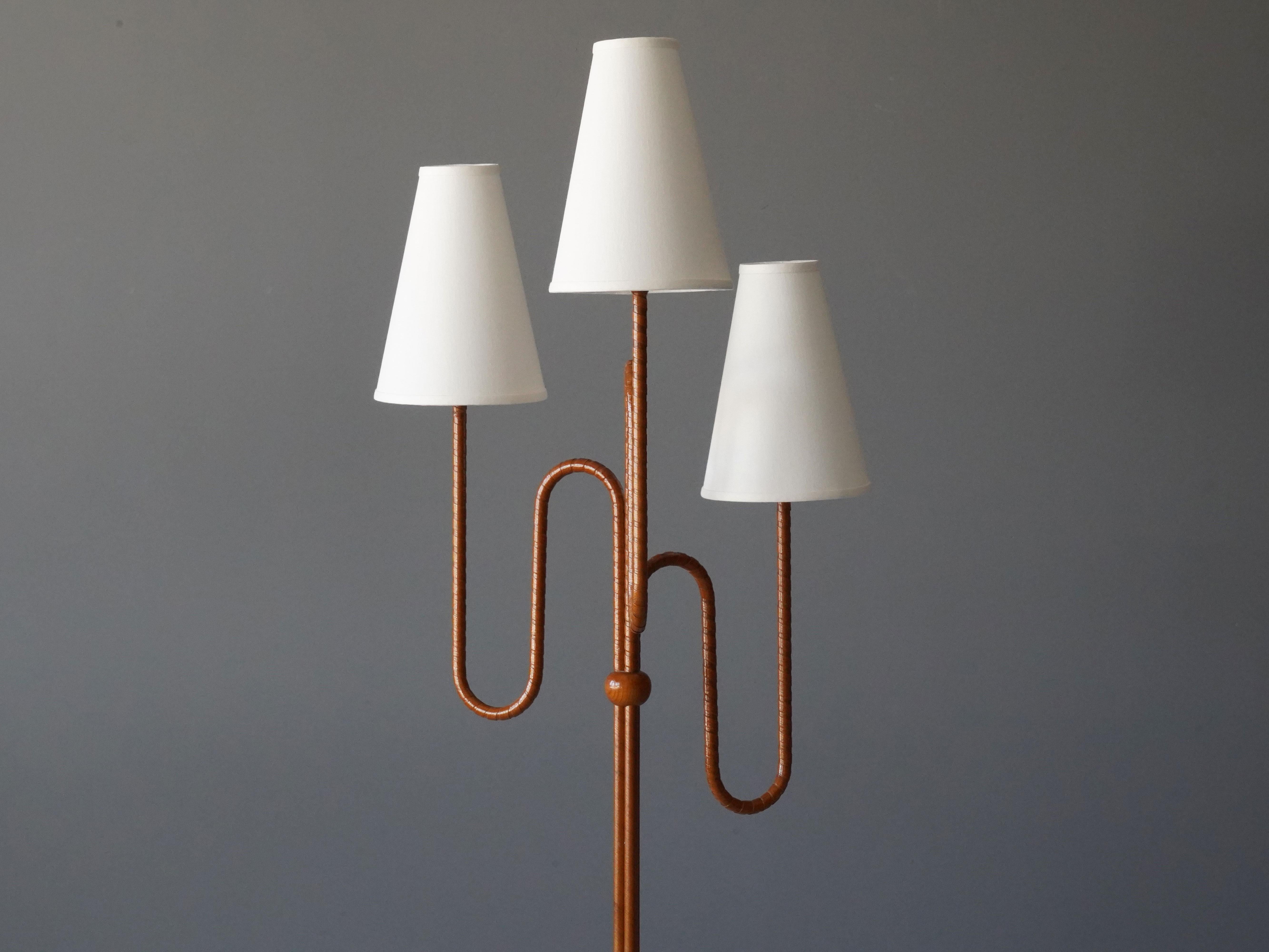 Swedish, Organic Three-Armed Floor Lamp, Brass, Wood, rattan, Linen, 1930s In Good Condition In High Point, NC