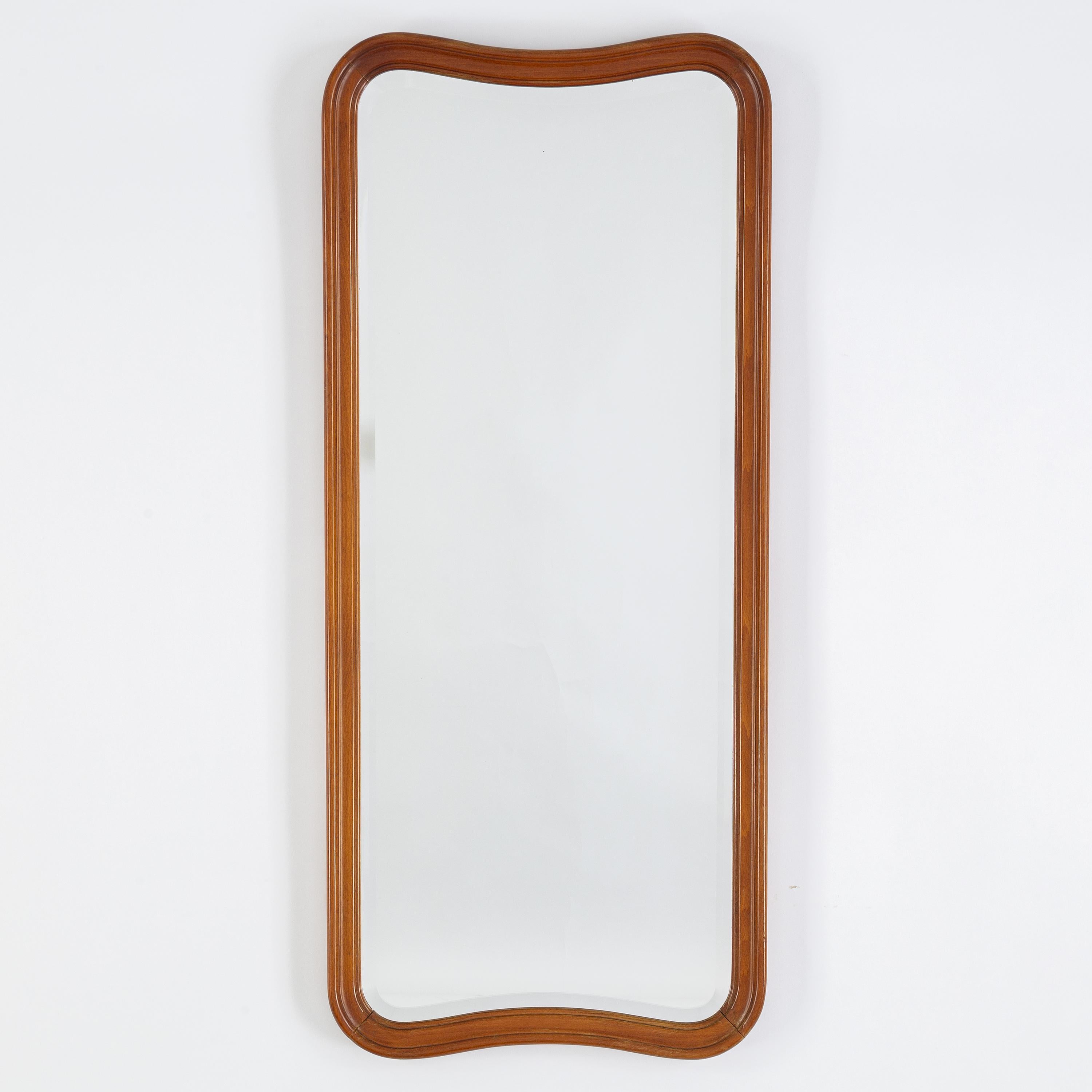A finely sculpted organic wall mirror. Produced and designed in Sweden, 1940s. 

Other designers of the period include Paolo Buffa, Fontana Arte, G.A. Berg, Jean Royere, and Josef Frank.