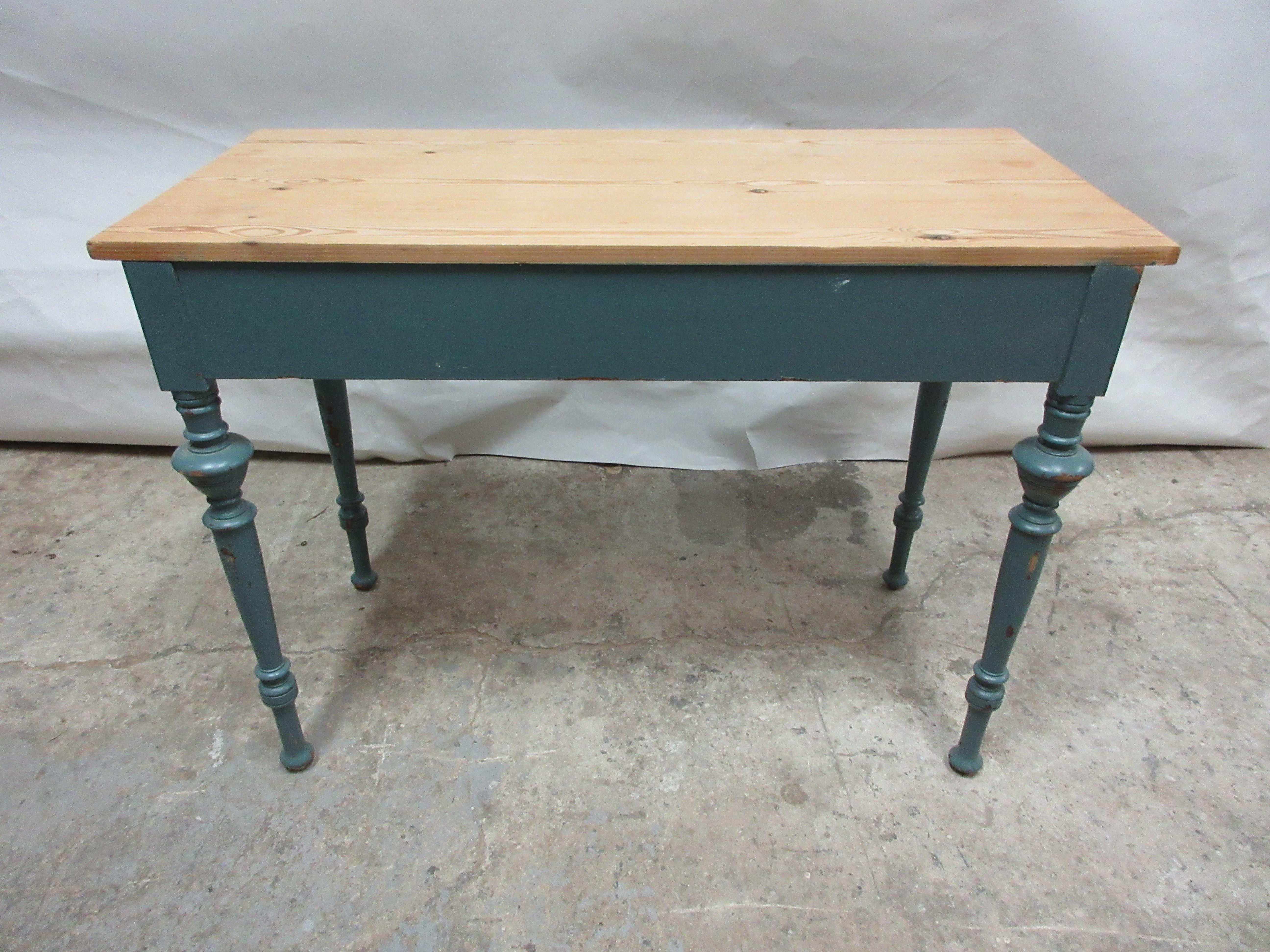 This is a Swedish original painted 2-drawer blue desk with a natural wood finished top.