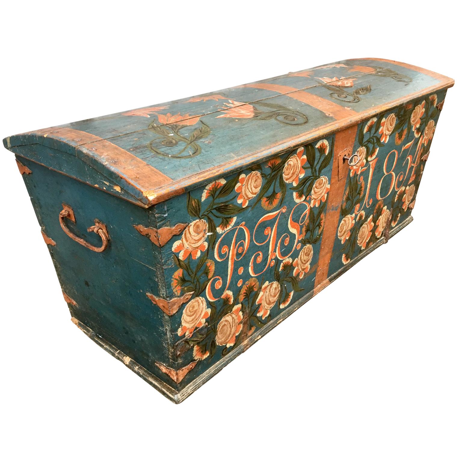 An original painted dome-top trunk from South Sweden, dated 1834. It has the initial of the father of the husband to be 