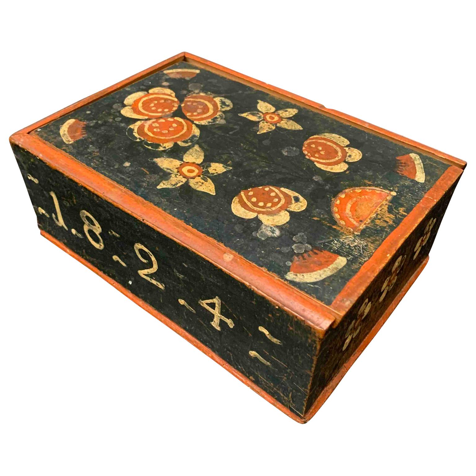 Swedish 19th century wooden monogrammed and dated Folk Art box, dated 1824.

An original painted box in dark blue and black color with flower decoration.
Belonged to a woman (the 