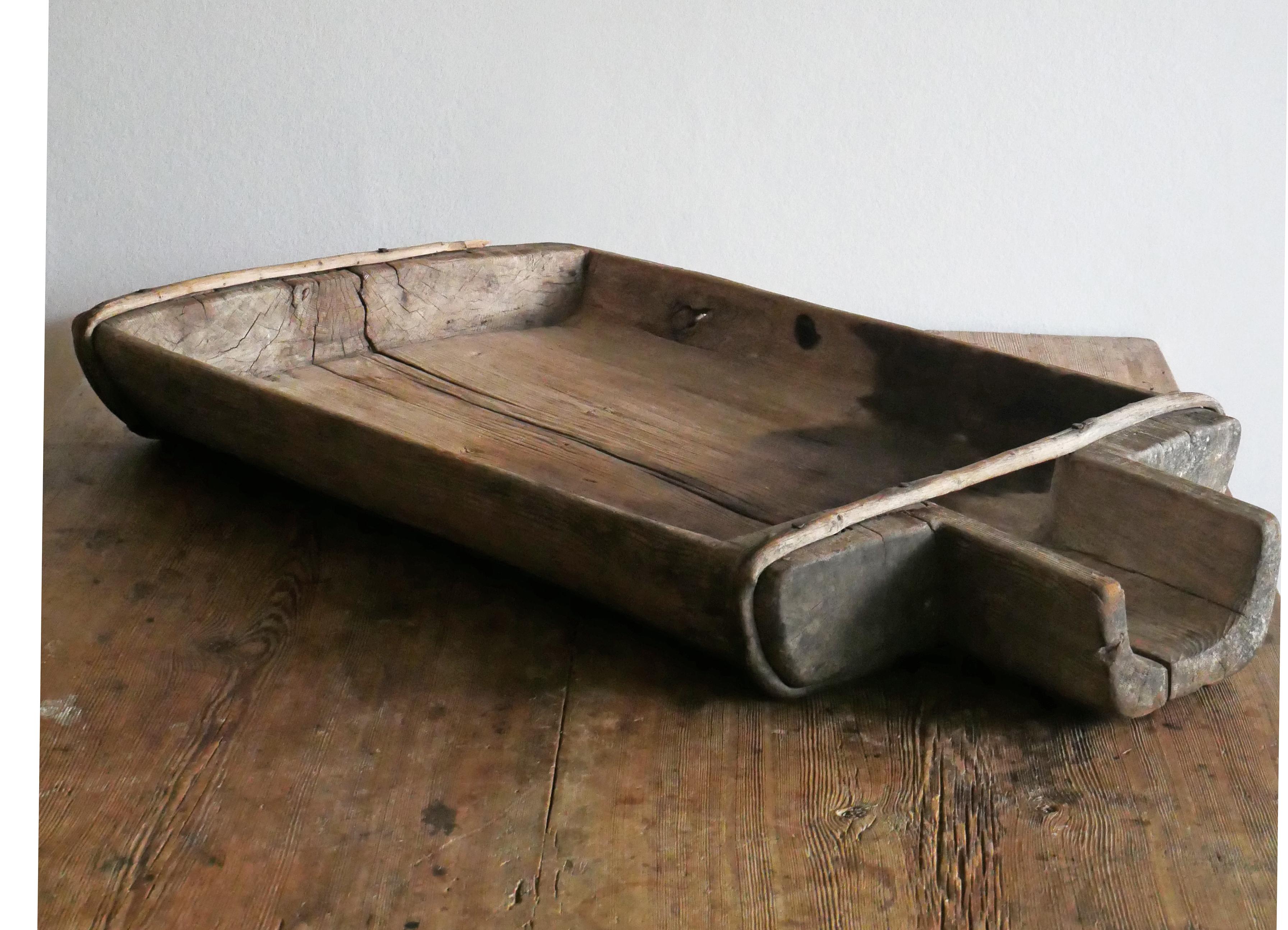 Swedish Ostränna from 1744.

Big trough used in cheese production.

Made in pine wood 1744, with owner marks and date. 
Beautiful piece with old repairs and smooth patina.

Height: 9 cm /3.5 inch
Widht: 81 cm /31.8 inch
Depth: 45 cm /17.7 inch