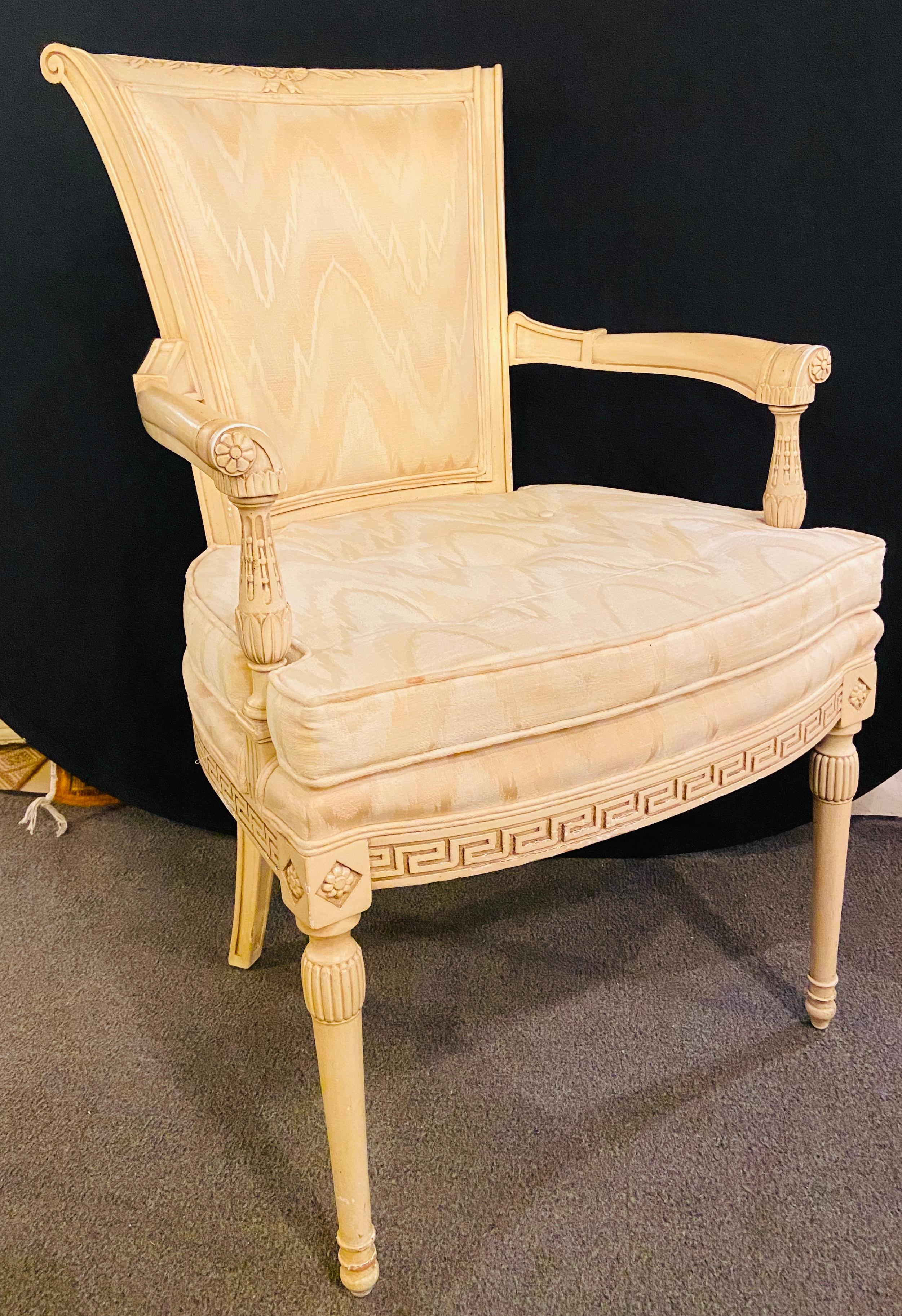 Swedish paint decorated Greek key design desk, arm, bergère chair.

A beautiful white Swedish mid-20th century Greek key design decorated chair. The upholstery is in great condition. The hand carved wood is done exquisitely and make it very