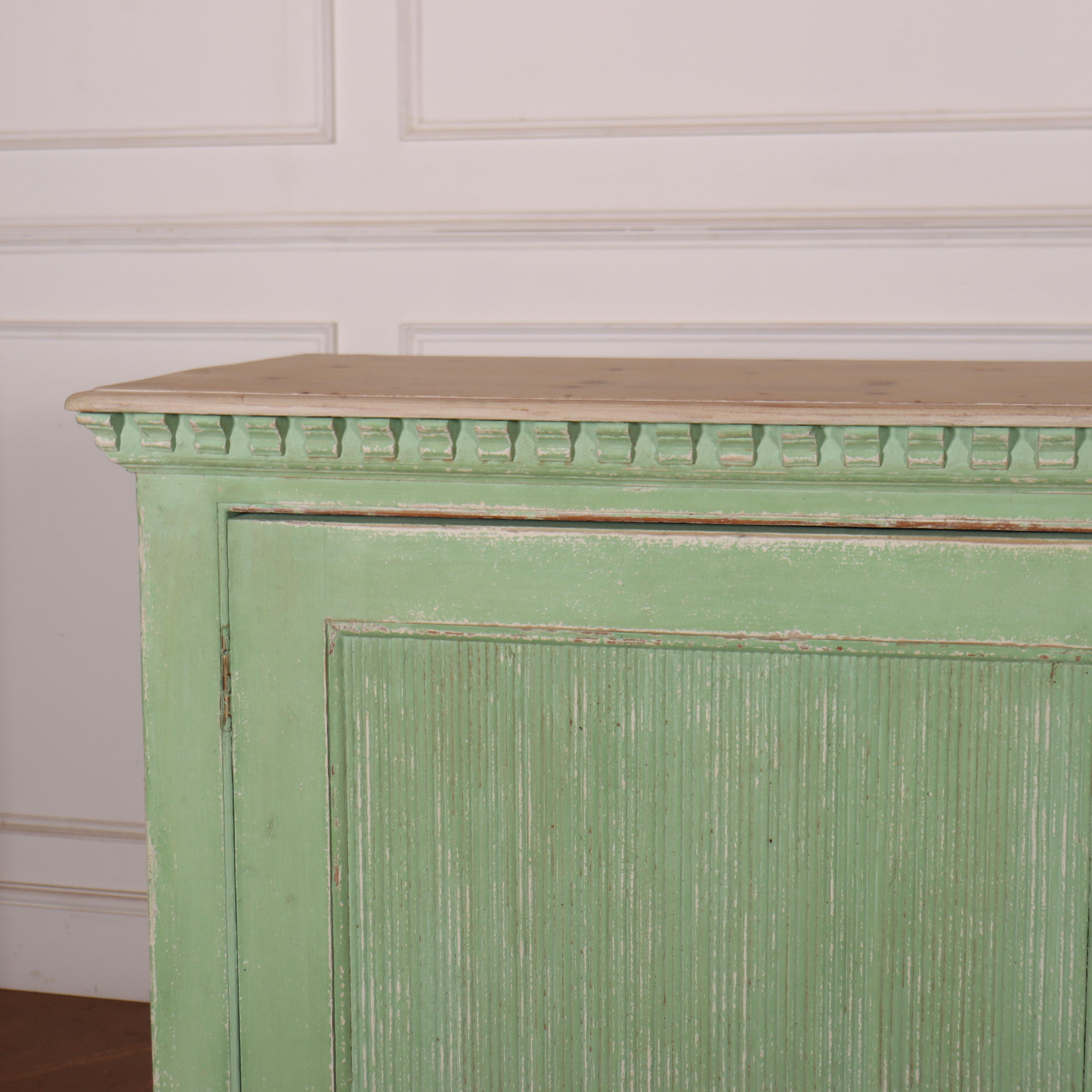 Large 19th C Swedish painted pine dresser base with reeded decoration to the doors. 1840.

Reference: 8080

Dimensions
83 inches (211 cms) Wide
21.5 inches (55 cms) Deep
41 inches (104 cms) High