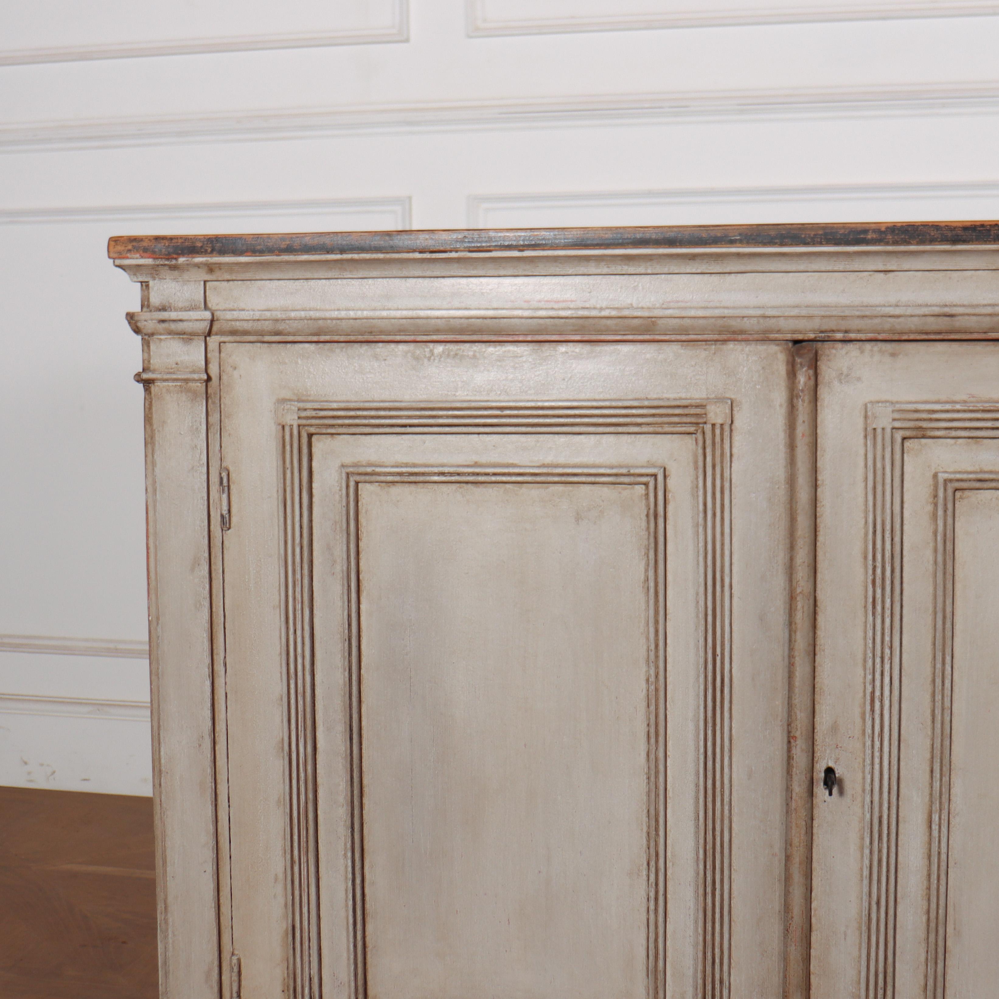 Large 19th C Swedish painted pine four door enfilade with a distressed top. 1840.

Reference: 8139

Dimensions
90 inches (229 cms) Wide
19 inches (48 cms) Deep
36 inches (91 cms) High