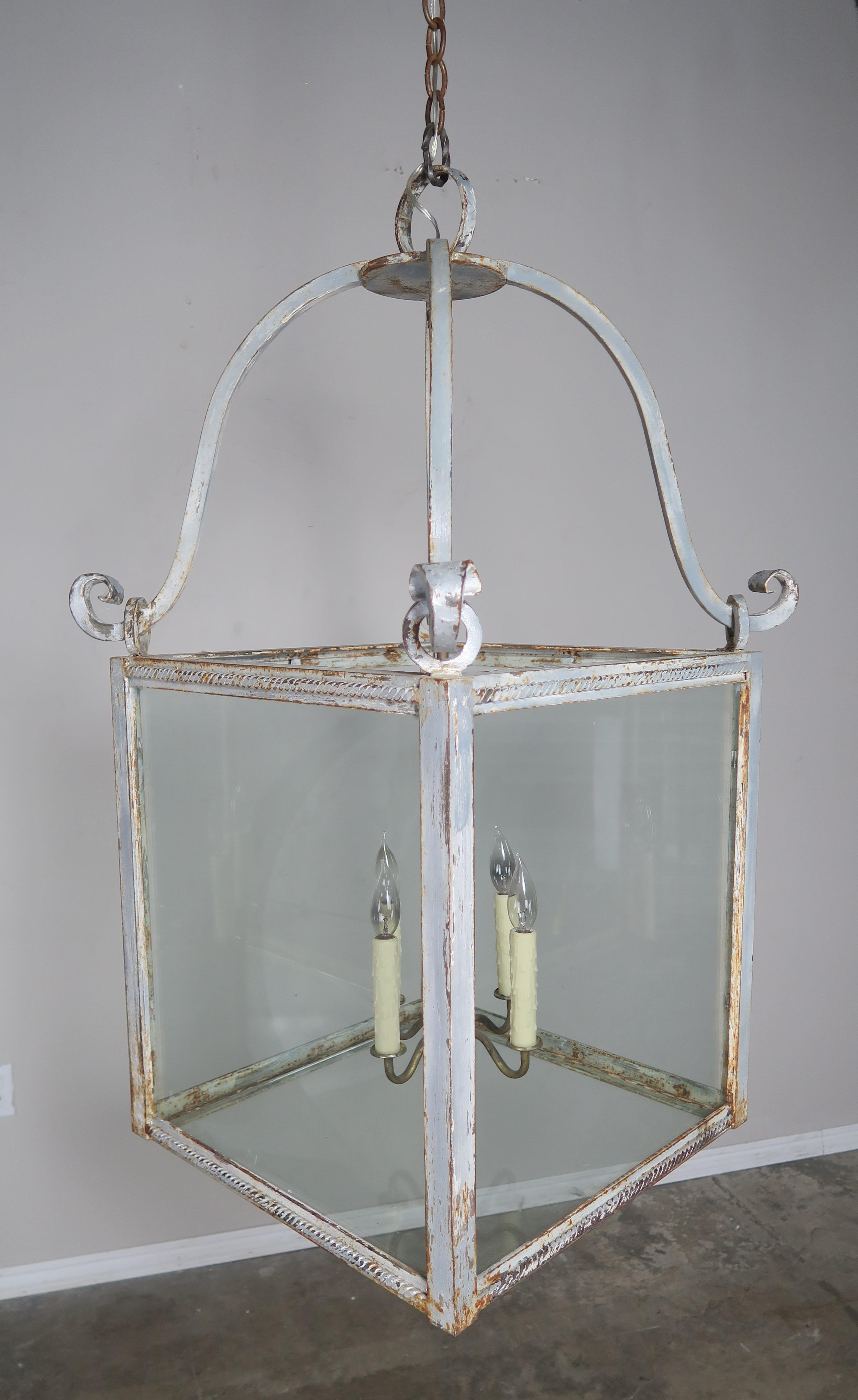 Swedish gray painted iron and glass lantern. The simple lines of this fixture will work in any style home. The lantern has been newly rewired and is ready to install. The chain and canopy are included.