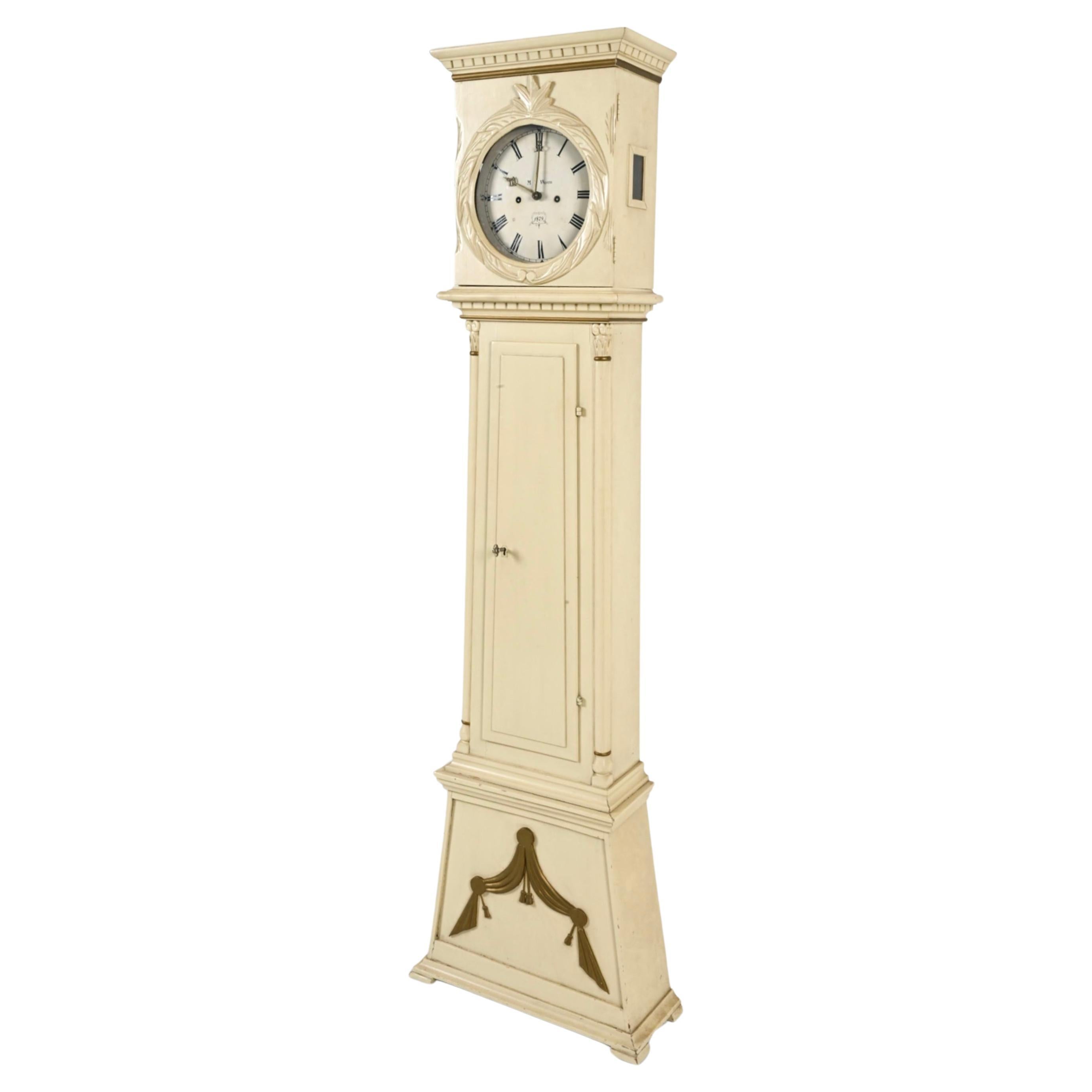19th century painted pine tall clock by Mogens Peter Westh. Painted brass face. Clock face contains the designer's name and is dated 1879. Intricate details were created by a true craftsman of the era. 