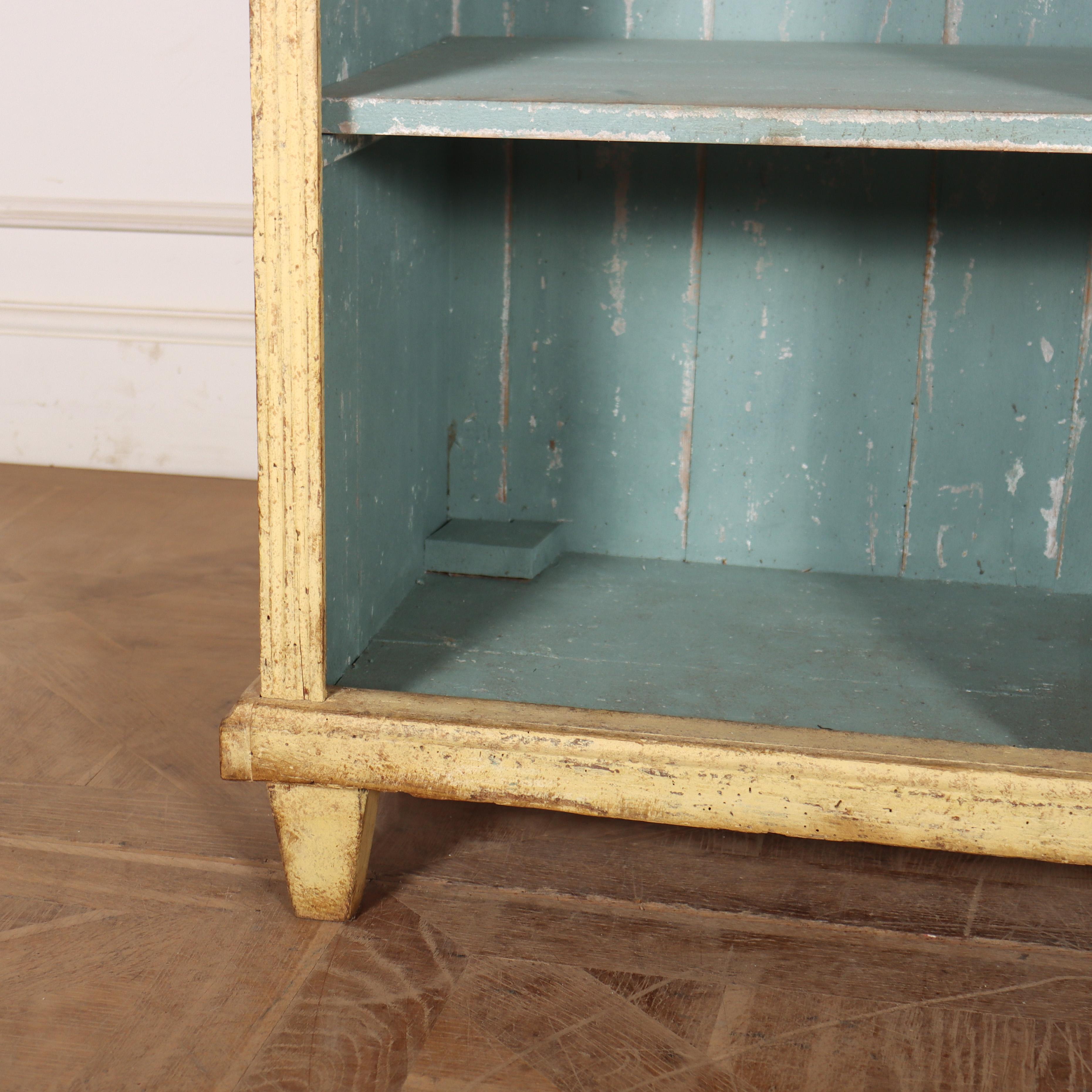 19th century Swedish two part painted open bookcase, with small columns on the uprights. 1840.

Top shelf depth is 10