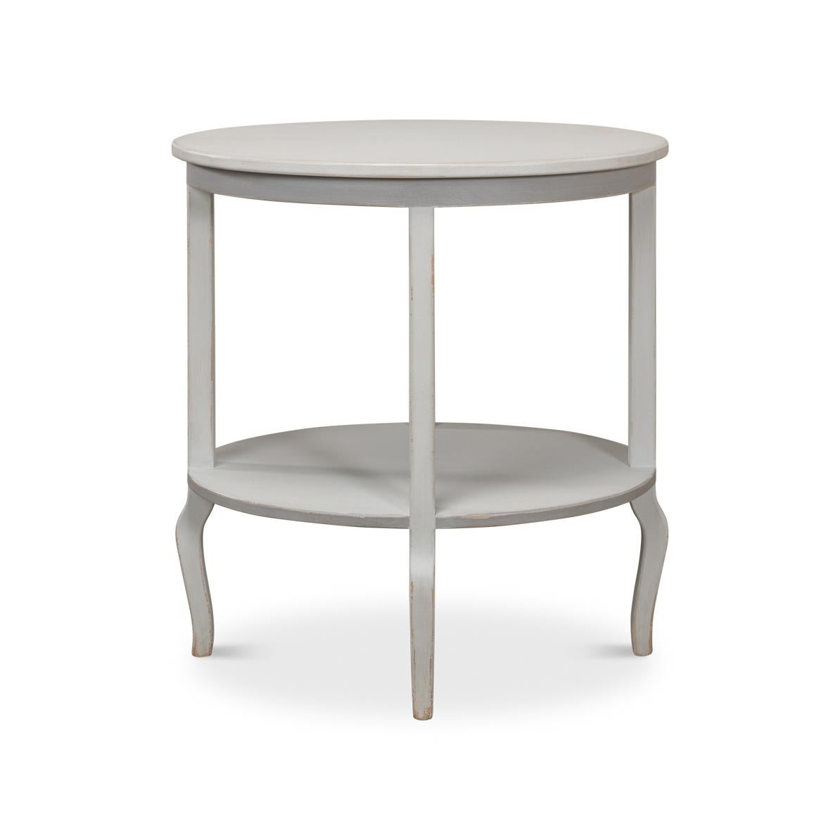 Painted Oval Side Table with straight lines and curved legs.
Add provincial flair with the slightly distressed and antiqued gray painted side table.
Dimensions: 29