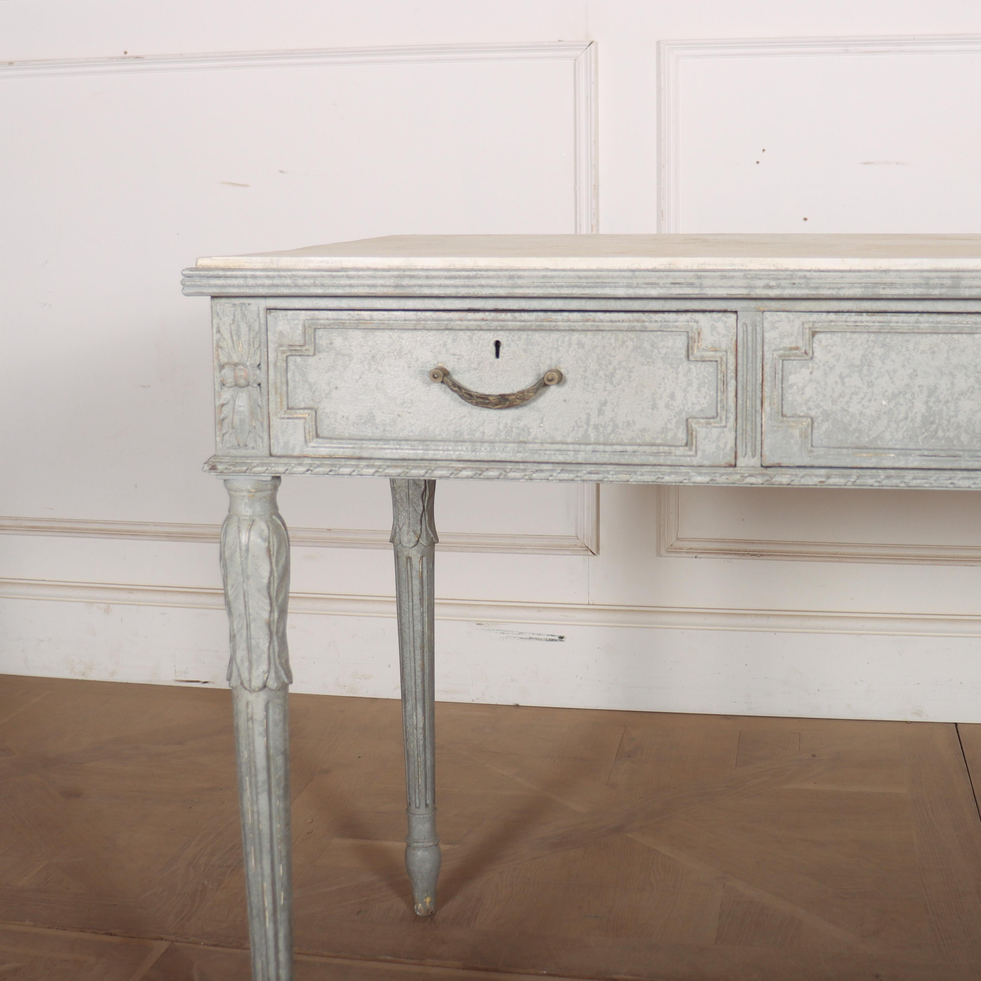 Late 19th century Swedish painted three drawer pine writing table/ desk with a faux marble top. 1890.

Code: 9124

Dimensions:
W: 52