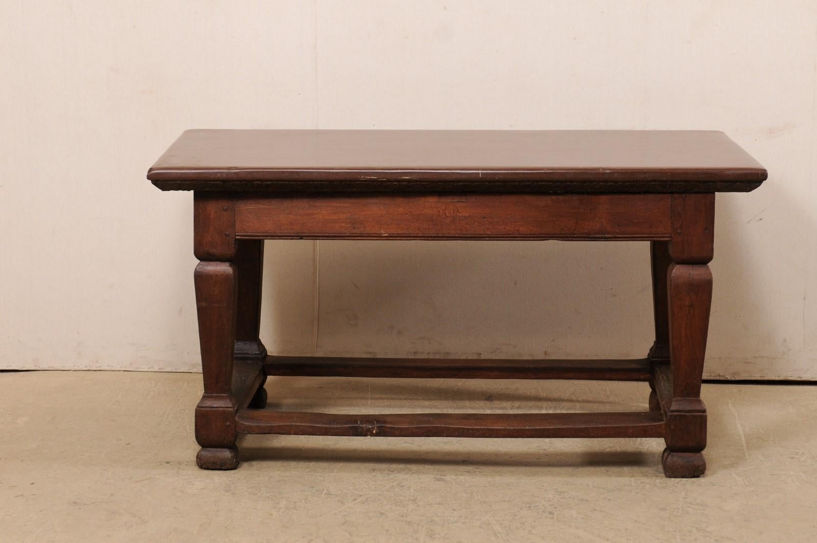 A Swedish period Baroque stone top table from the early 18th century. This antique kitchen table from Sweden features it's original stone top, rectangular in shape, which rests atop a plain apron, and raised upon four robust baluster-carved legs.