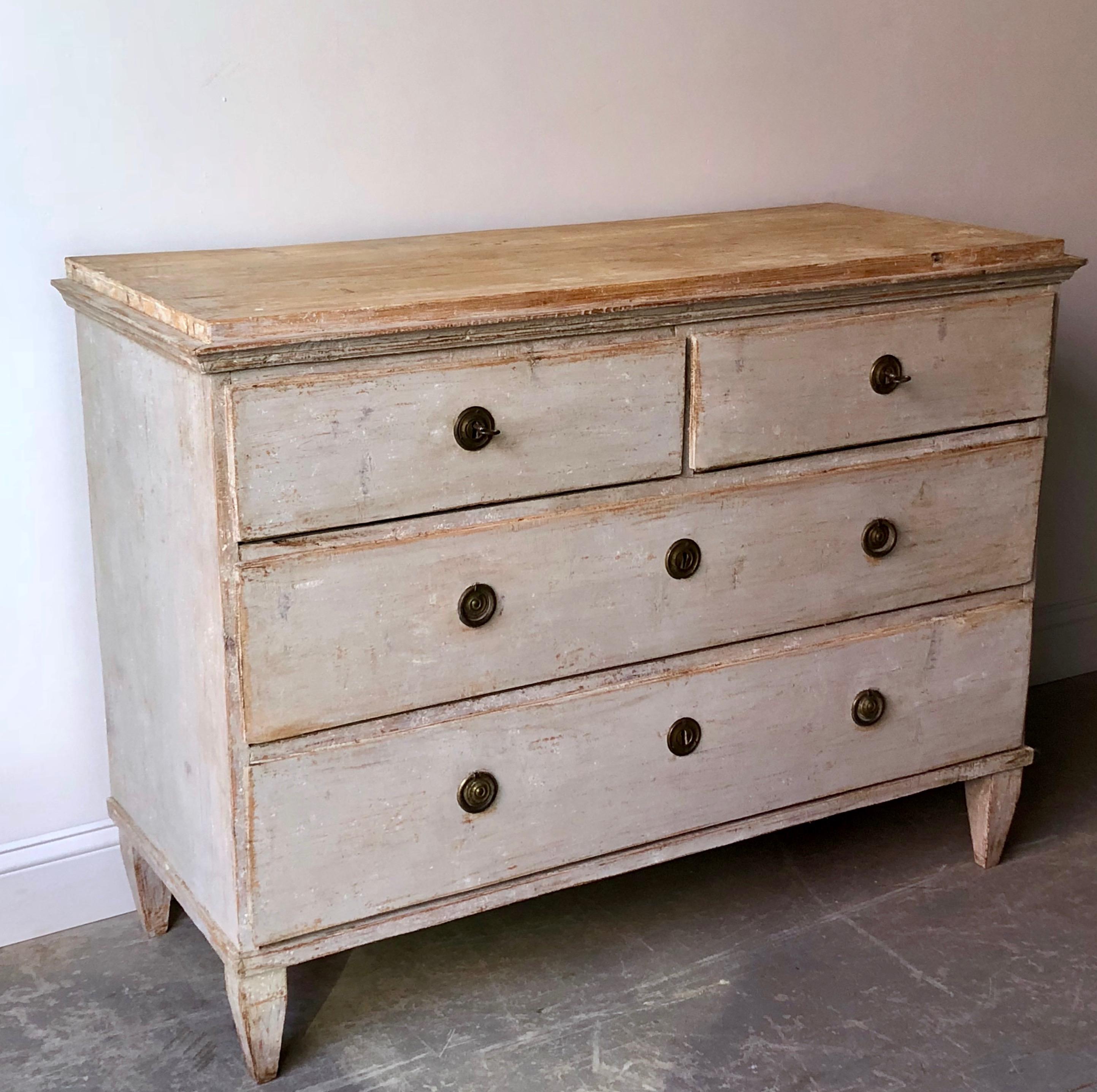 A handsome Swedish Gustavian period chest of drawers with original hardware in original wonderful worn patina. 
Stockholm, Sweden, 1800-1810.
Here are few examples, surprising pieces and objects, authentic, decorative and rare items that you will