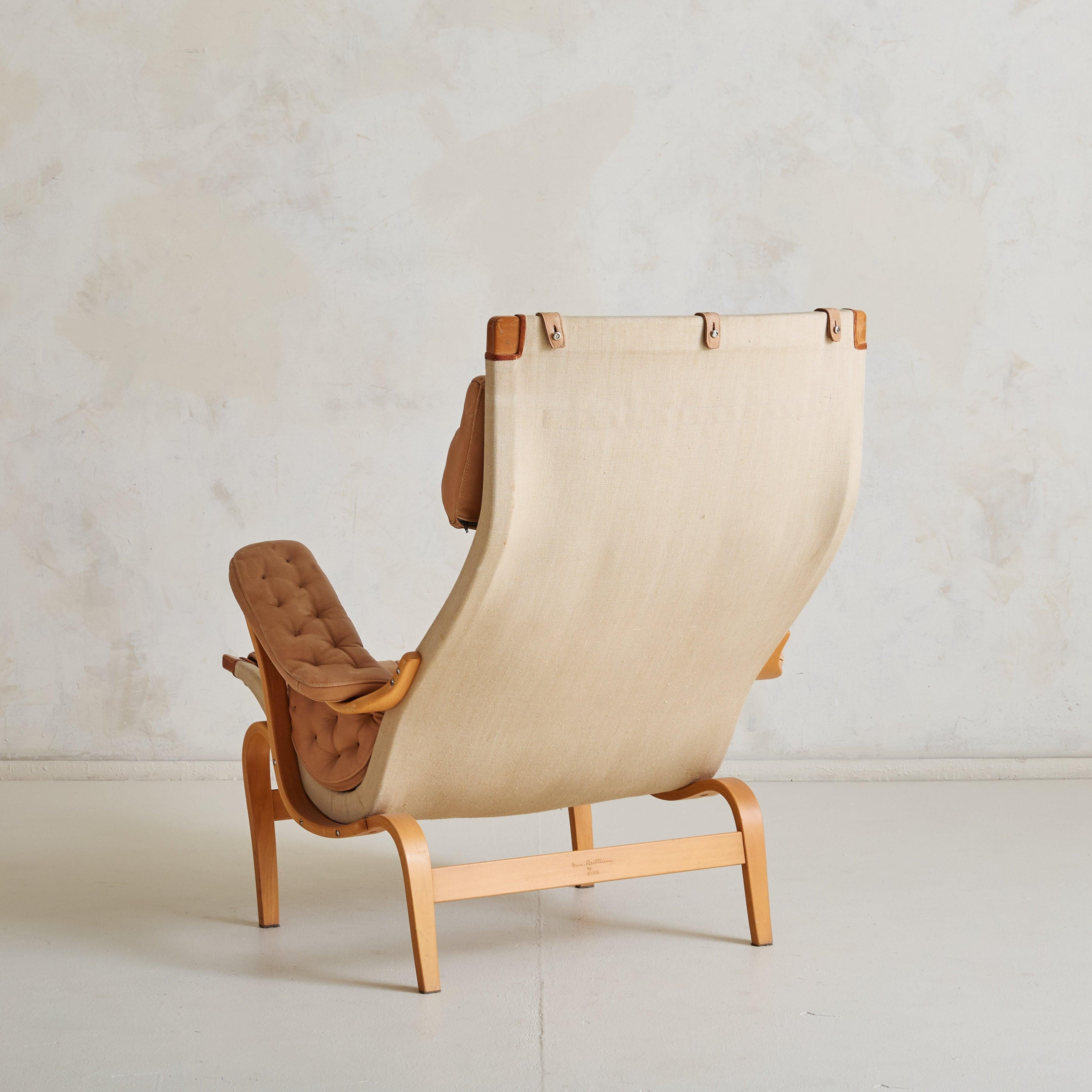 Mid-Century moderno Poltrona svedese 'Pernilla' in pelle di castagno di Bruno Mathsson per DUX, anni '60