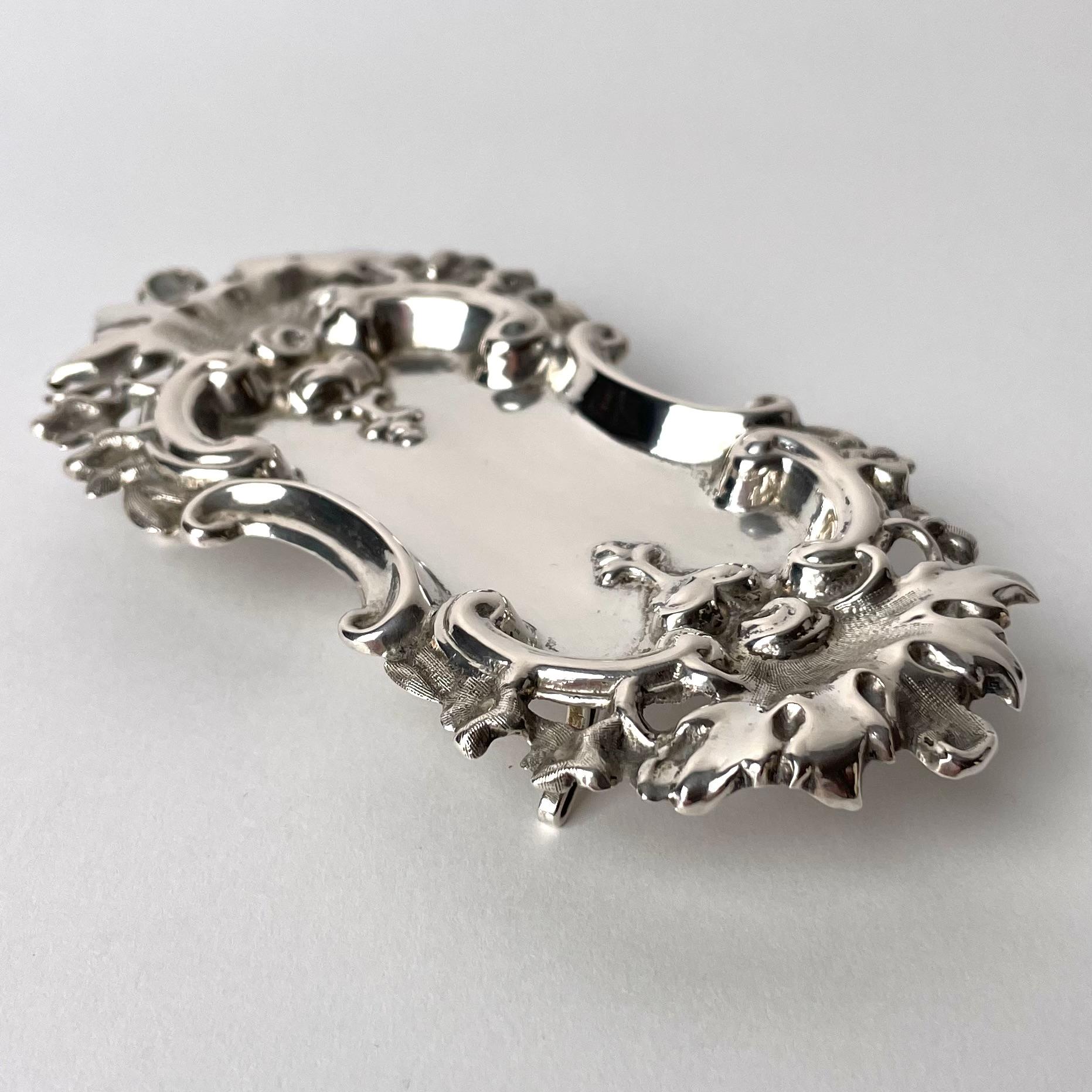 Beautiful Swedish pin tray in stamped silver dated 1865 (L5) in Rococo Revival. Richly decorated in period style.

Wear consistent with age and use