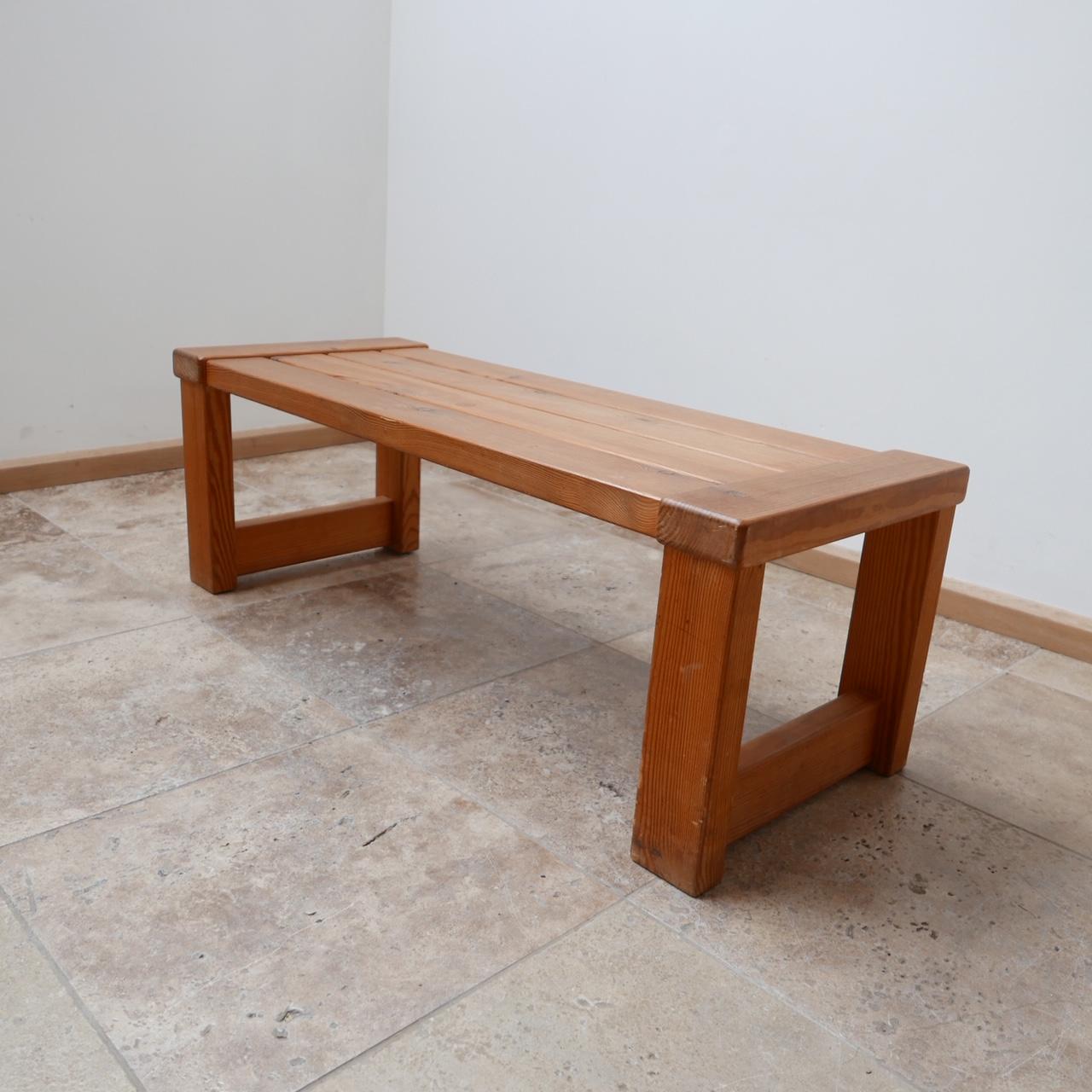 A midcentury pine bench which could be used as a coffee table.

By Glas master.

Sweden, circa 1960s.

Perfect for the end of a bed or hallway.

Dimensions: 35 H x 100 W x 40 D in cm.
 