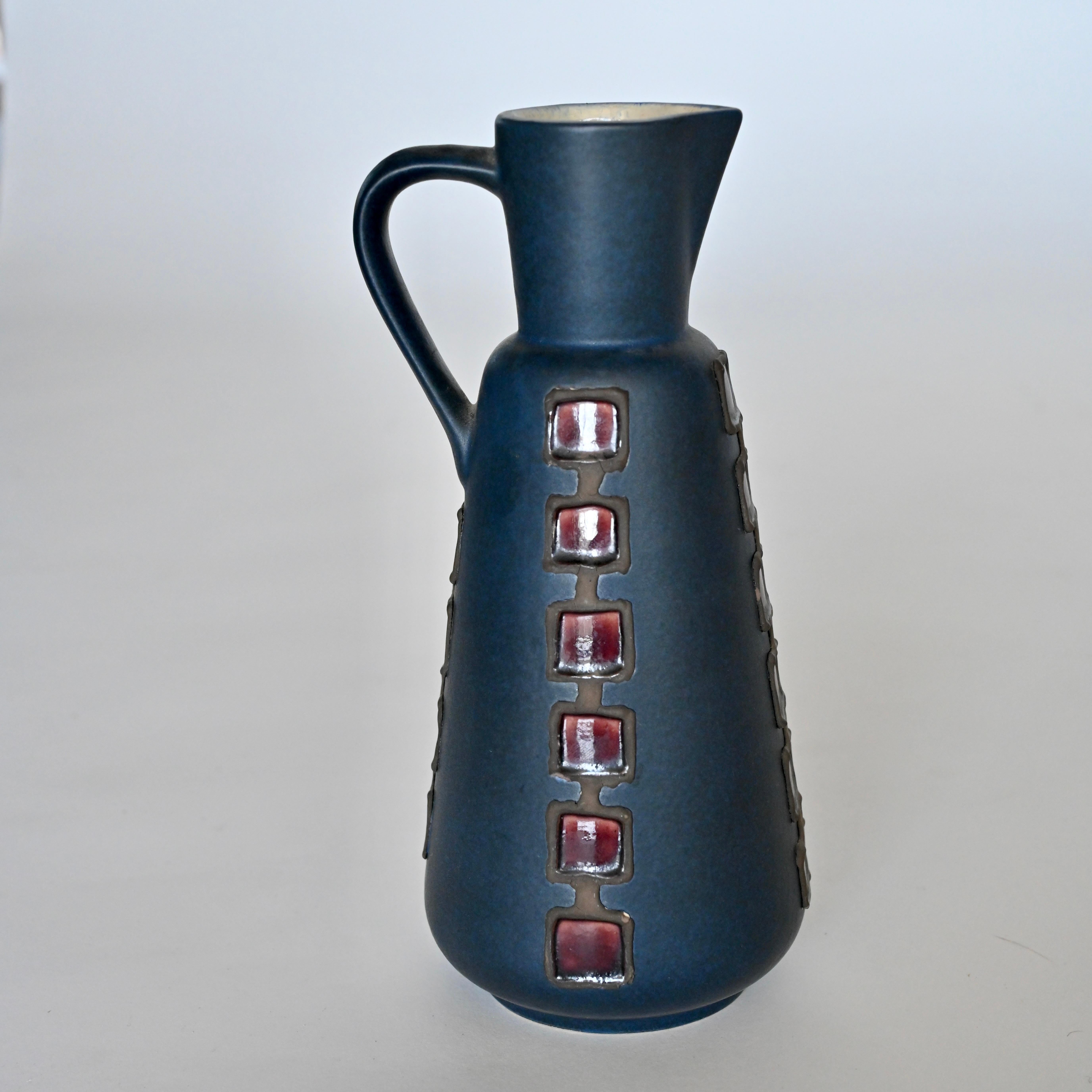 Unique blue glazed pitcher / vase with decorative details. Marked 261/26 at bottom. Sweden, Mid 20th Century.
