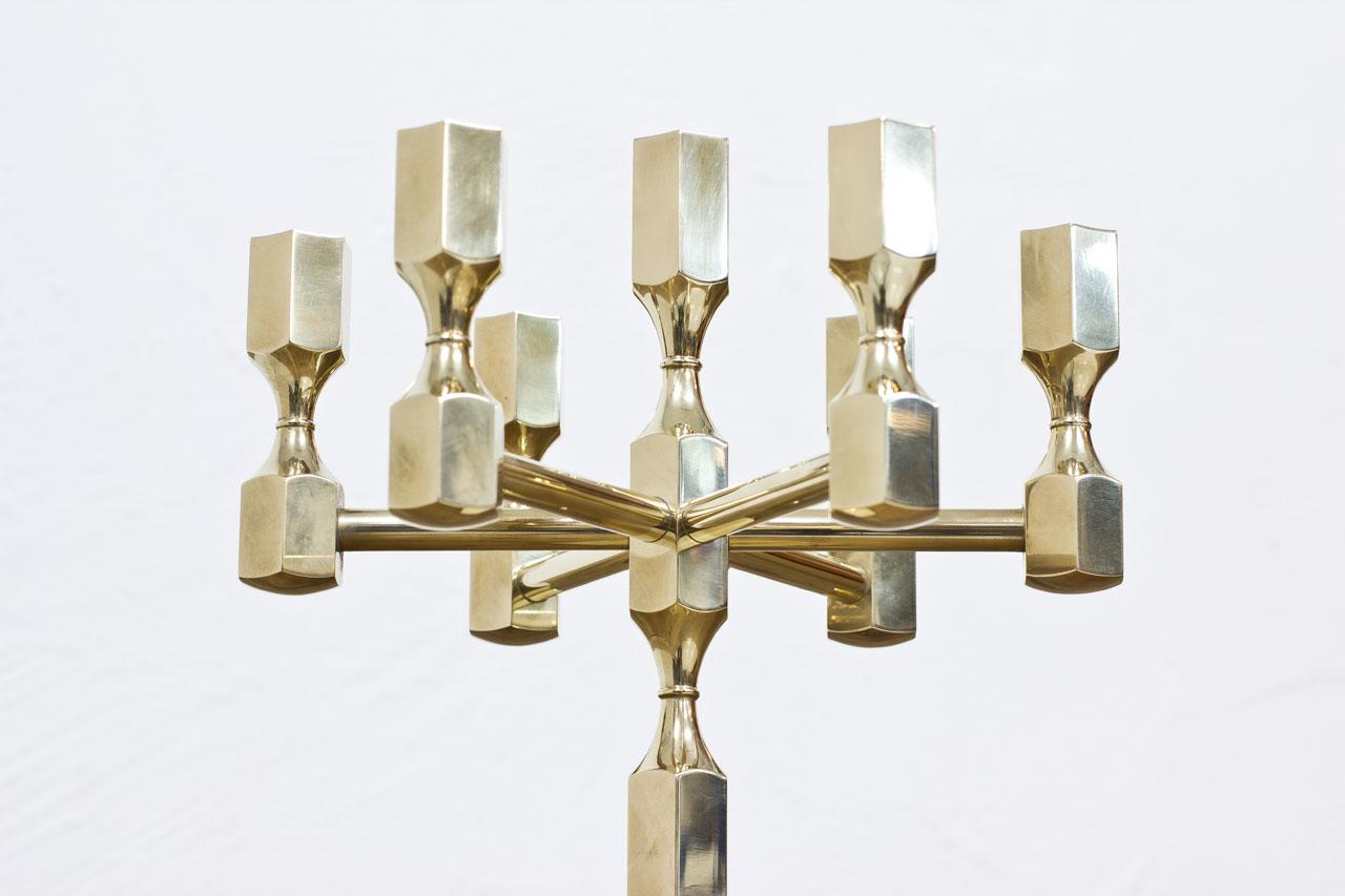 7–arm solid polished brass candelabra designed by Lars Bergsten, made by Gusum Metallslöjden in Sweden. Engraved, dated 1972.