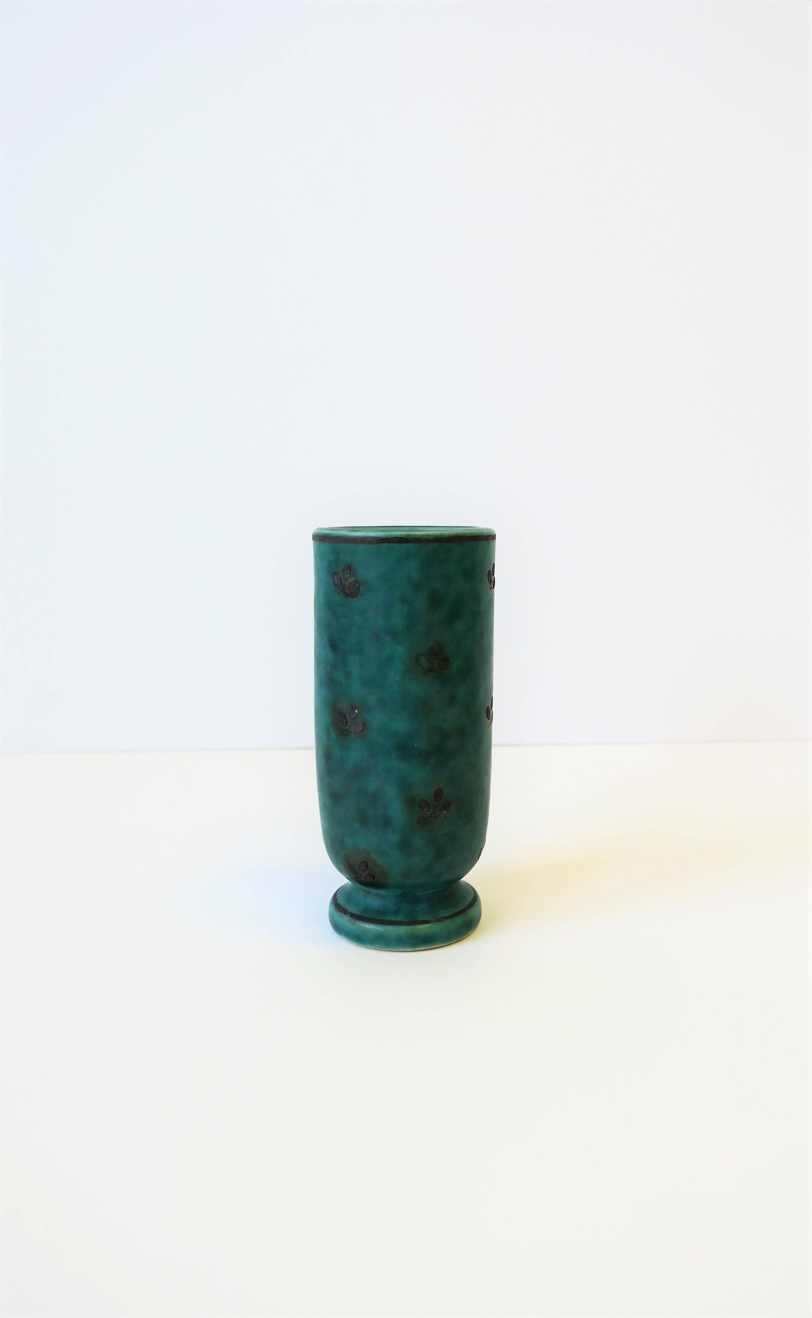 A beautiful petite Swedish pottery vase in a blue/green hue with tiny sterling silver leaf application, circa mid-20th century, Sweden. With maker's mark on bottom as show in image #15; 