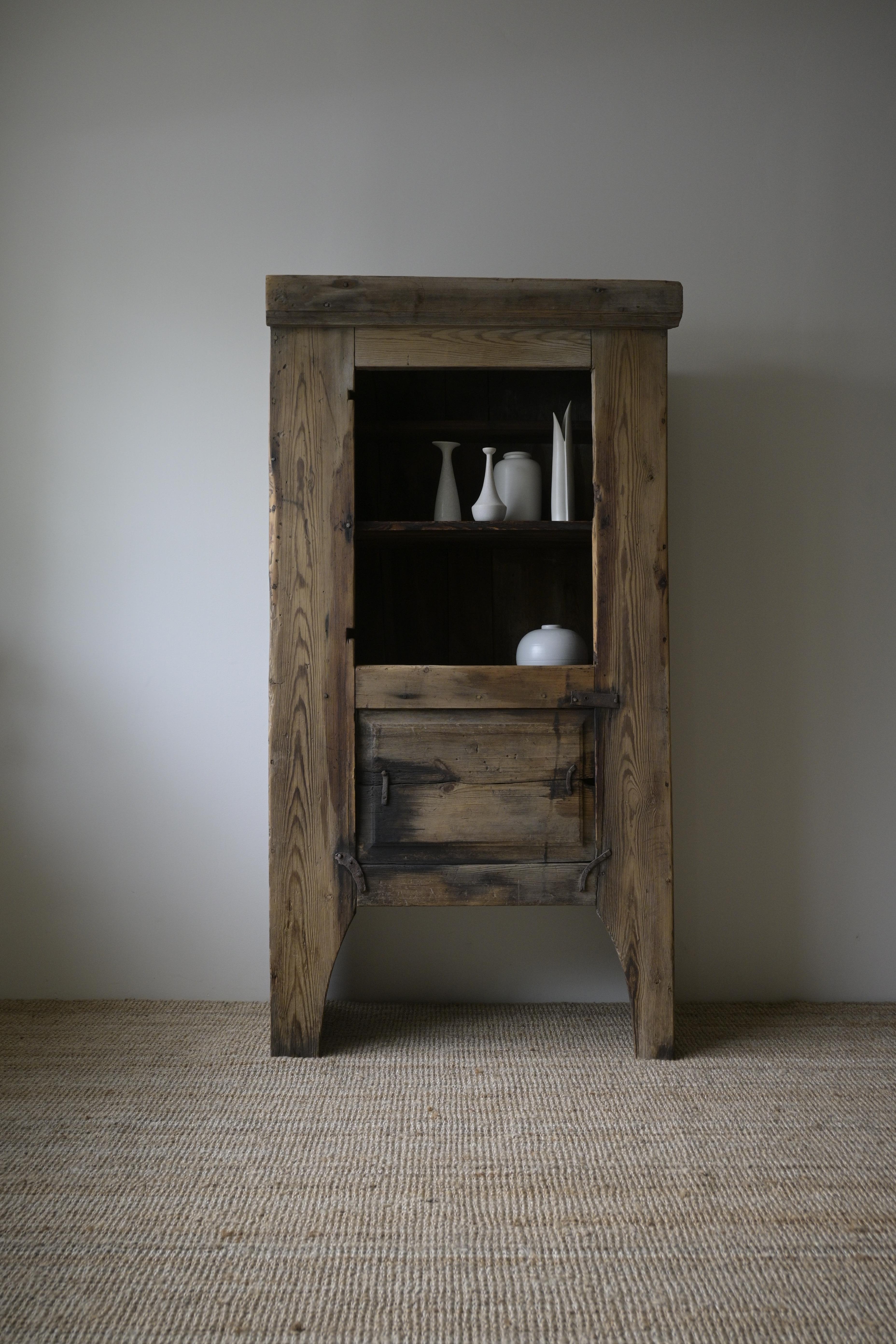 Swedish Primitive Cabinet from Dalarna, ca 1790–1830

You take what you have - old repairs, mostly done with old horseshoes.
The patina is truly beautiful and shows centuries of use.
Never painted, and originally had a door.

Made in pine