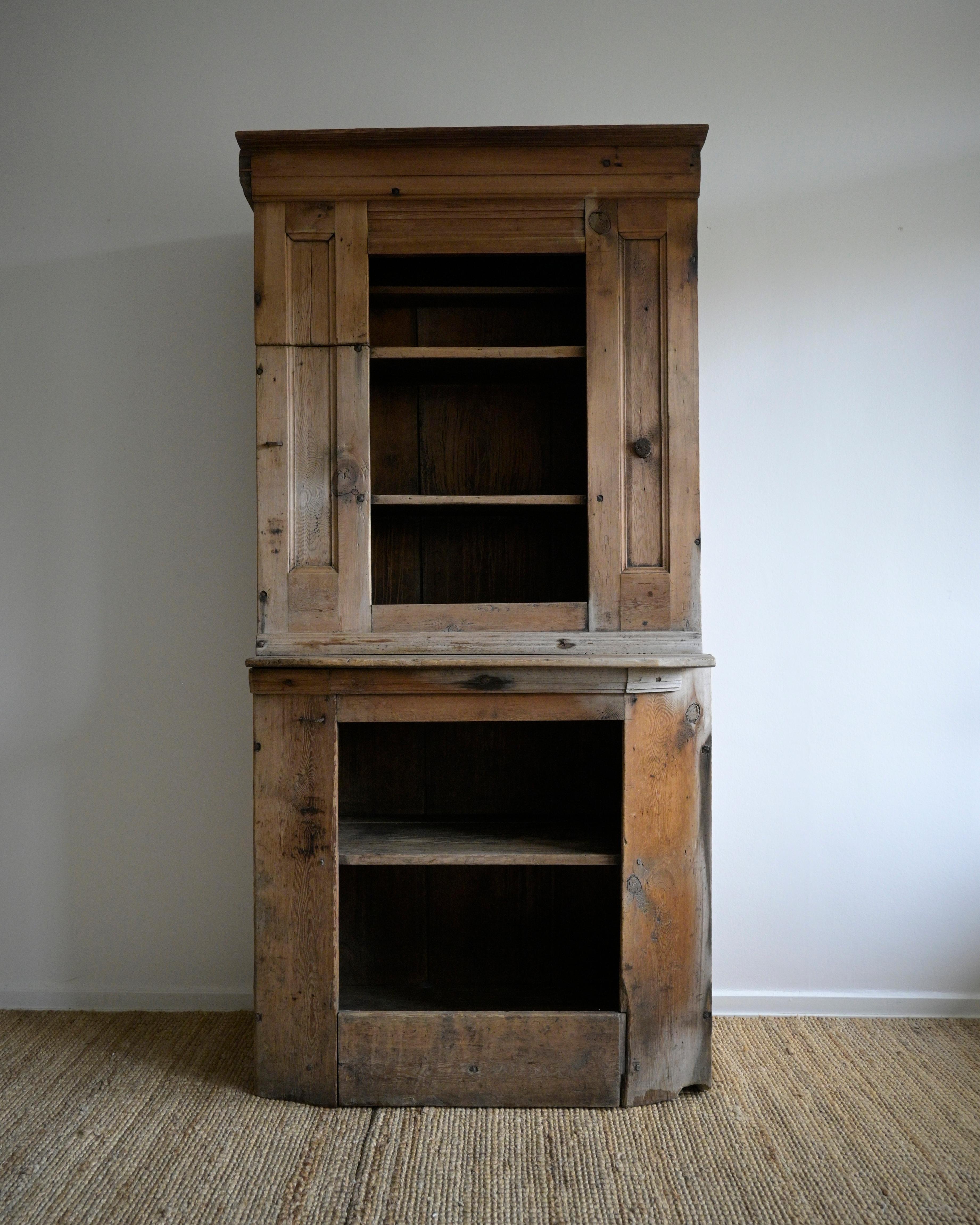 Swedish primitive Cabinet from the early 18th Century

Made of Pine wood.

Untouched by paint or excessively restoration, with a natural patina that only time can create.

It has a hidden compartment in the upper left corner.

The wood has been