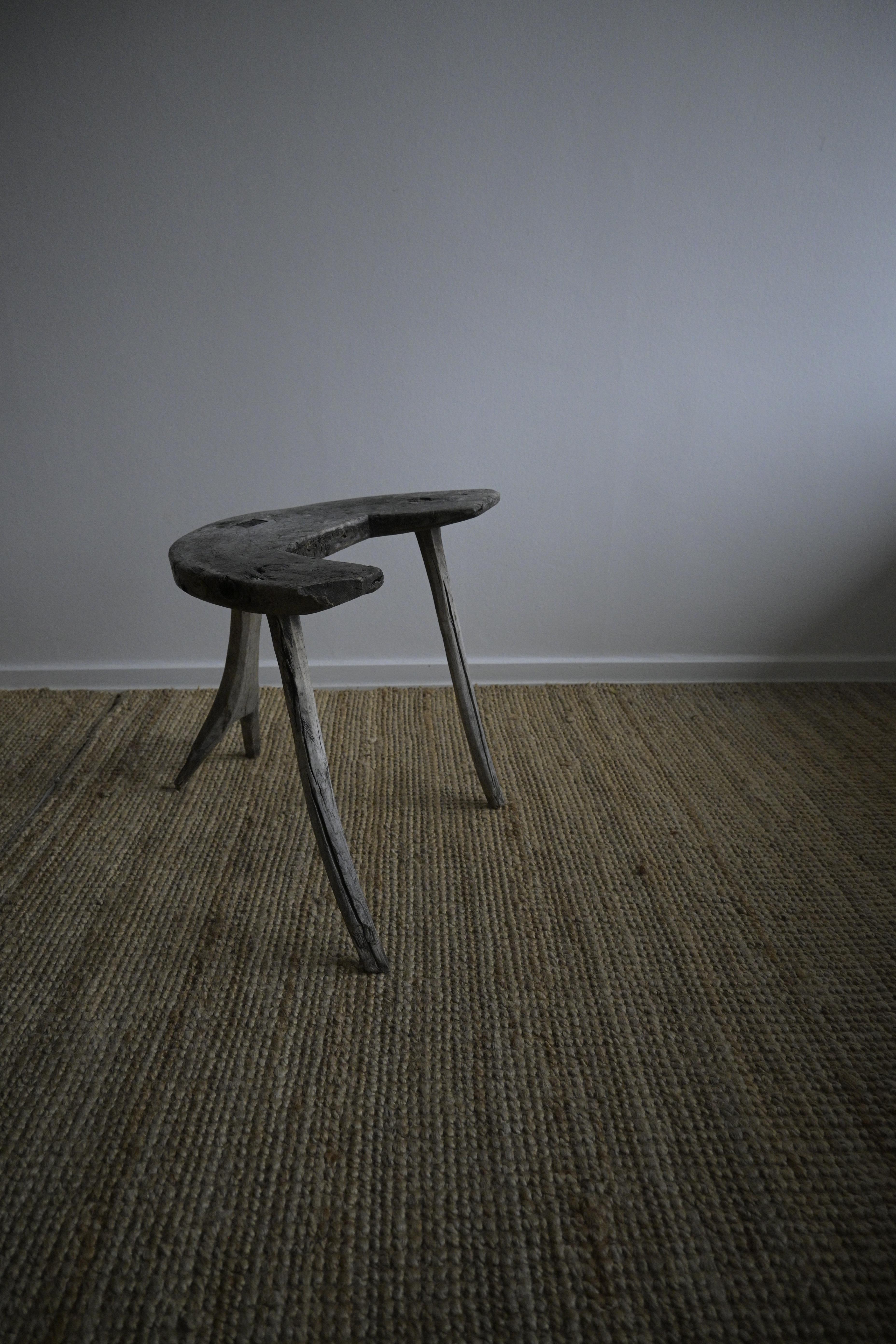 A Swedish Primitive Milking Stool ca1850-1880s

Featuring a beautiful gray tone acquired through time and sun exposure, along with distinctive quirky legs

Sold as is condition

Heigth: 43 cm / inch
Width: 49 cm / inch
Depth: 36 cm / inch
