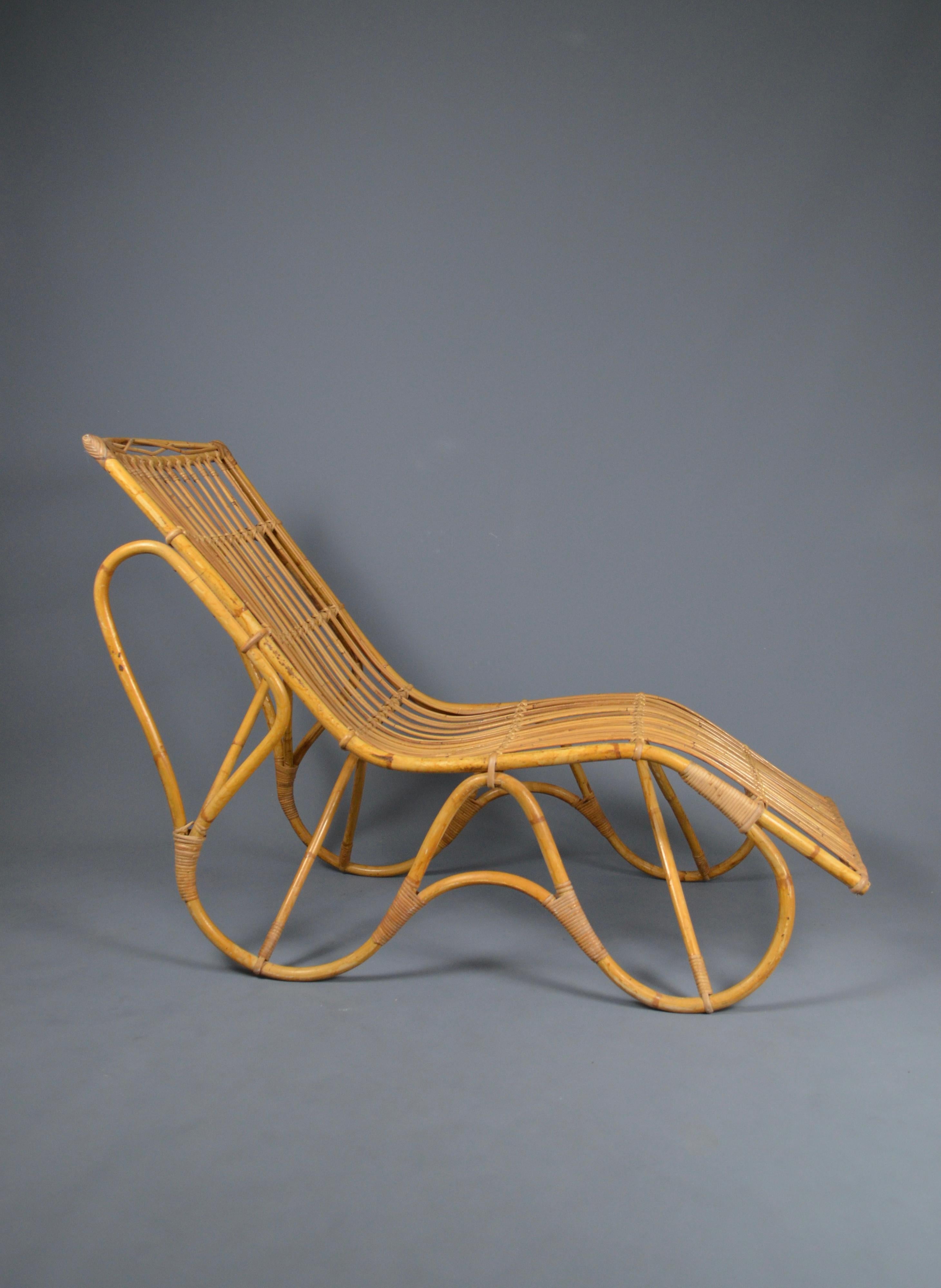 Elegante sillón sueco de ratán y bambú de los años 60.
Buen estado