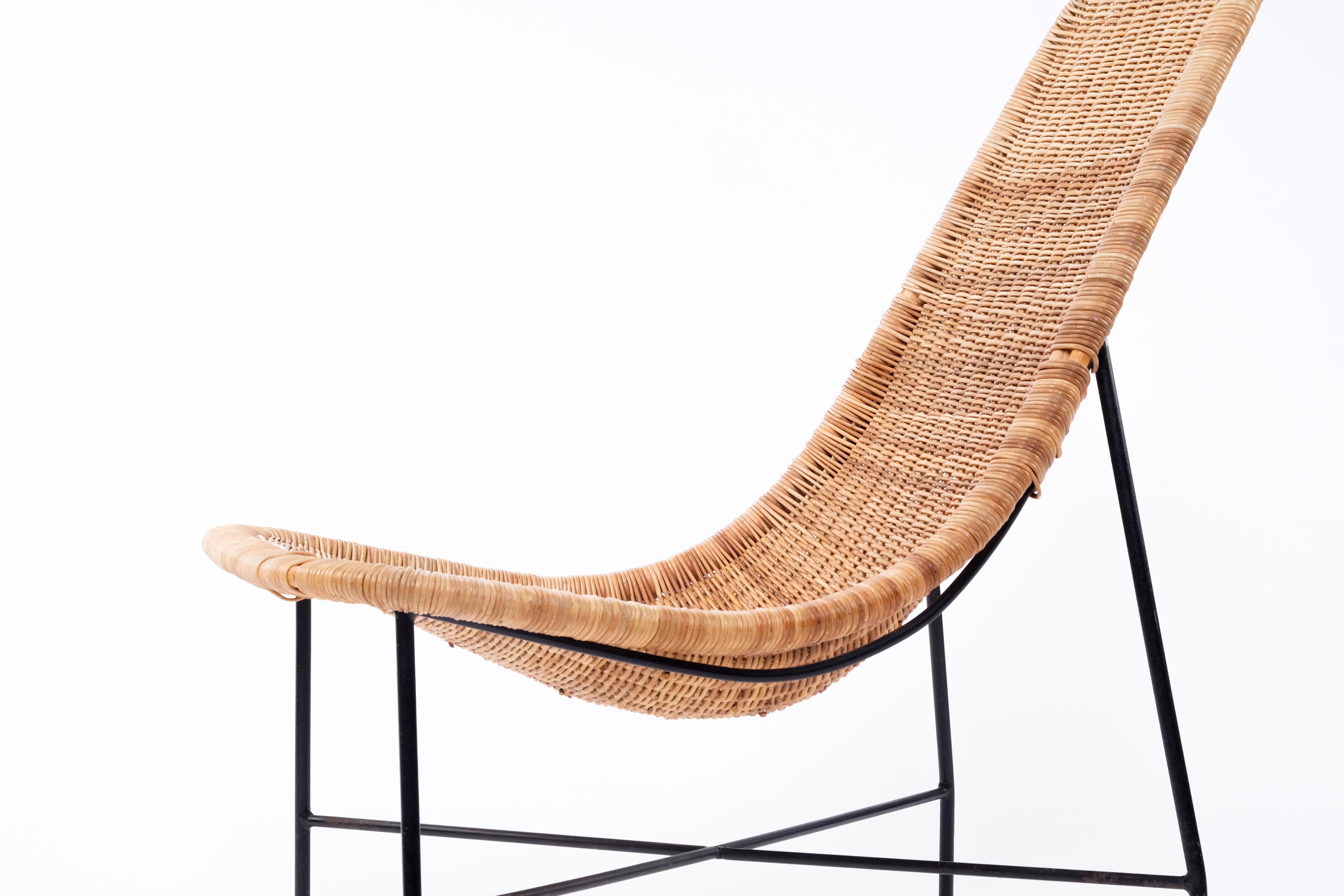 Produced in Sweden, 1960s. 
Black lacquered steel and hand weaved wicker.
 