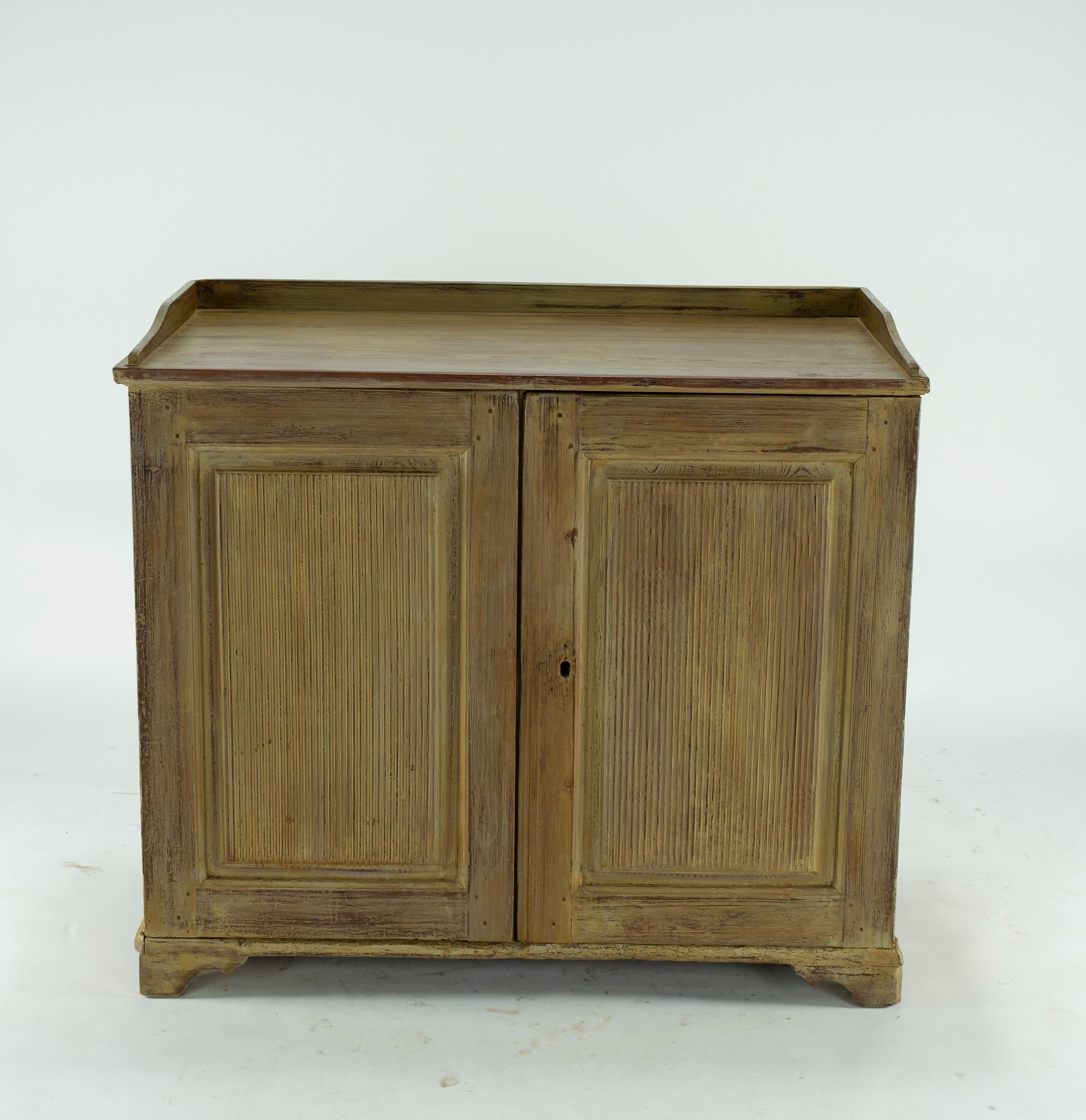 Painted Swedish reeded buffet with two doors.
