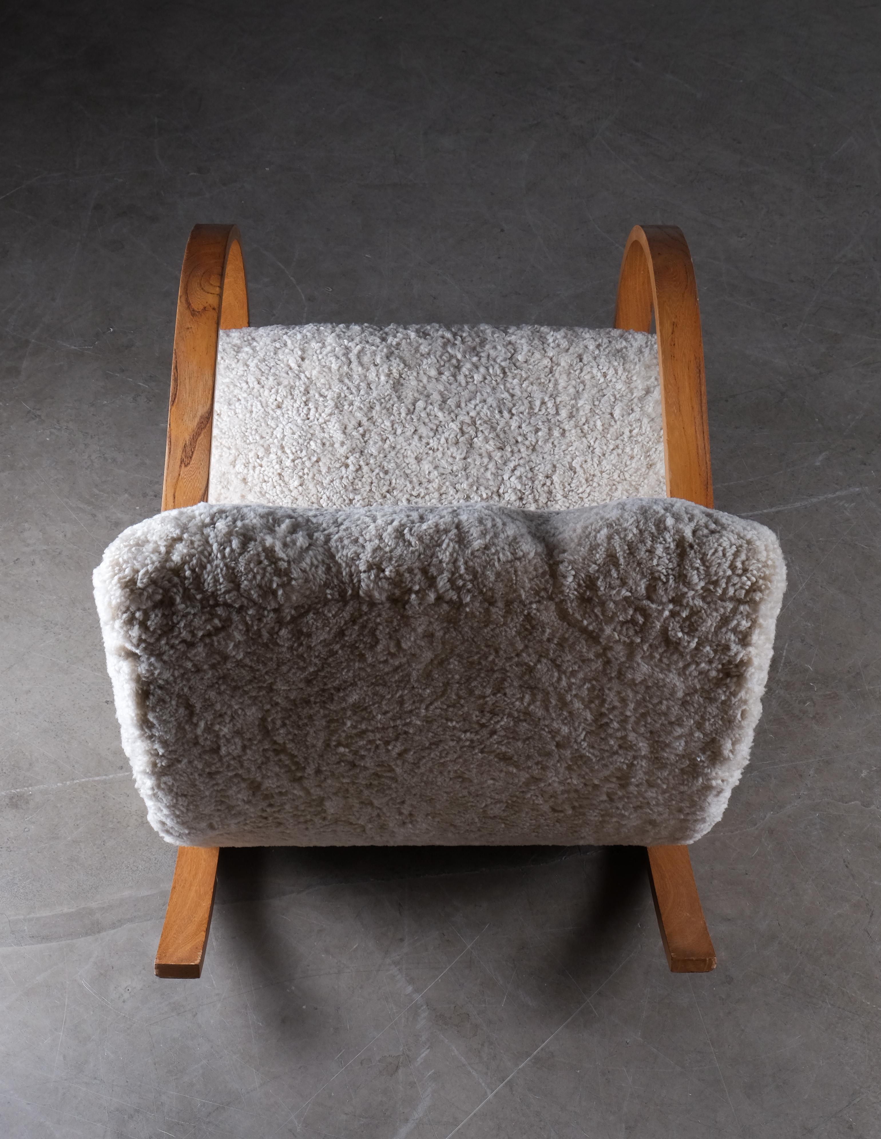 Scandinavian Modern Swedish Rocking Chair in Sheepskin, 1940s For Sale