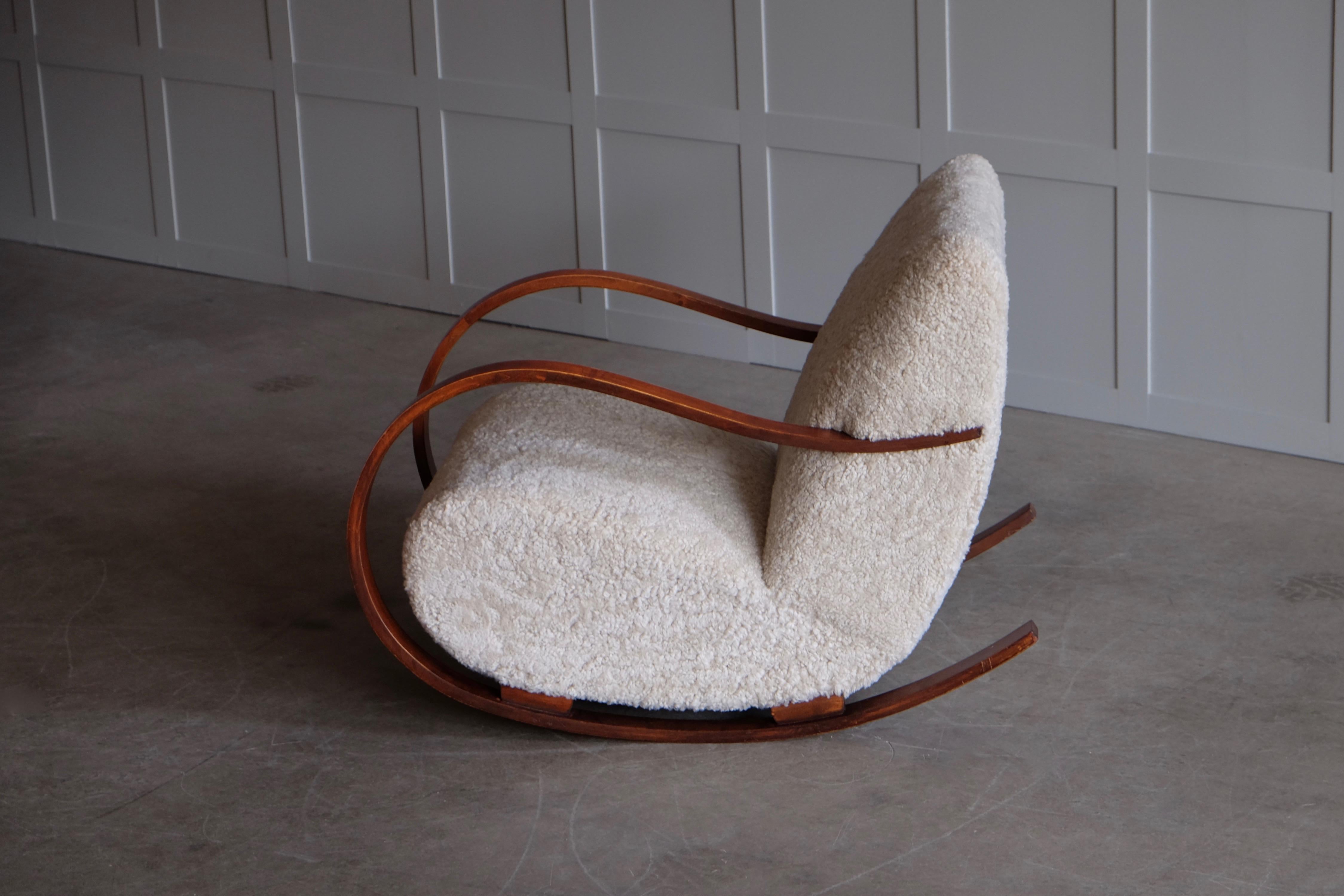 Swedish Rocking Chair in Sheepskin, 1950s 5